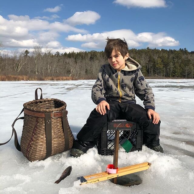 Another fine day out on the ice with my boys and @jess.maive.carey. The ice fishing season is coming to an end but not without a few fish to fry up in my cast iron pan. My oldest has surely come into his own on the ice and now with his own kit of @jacktrapsinc and this beautiful basket from @adkbaskets, he’s set up for a good long while.