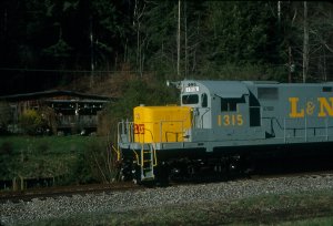 What is more Appalachian than an L&N C-420 passing a house up a holler? Here we do it on SARM's museum line.