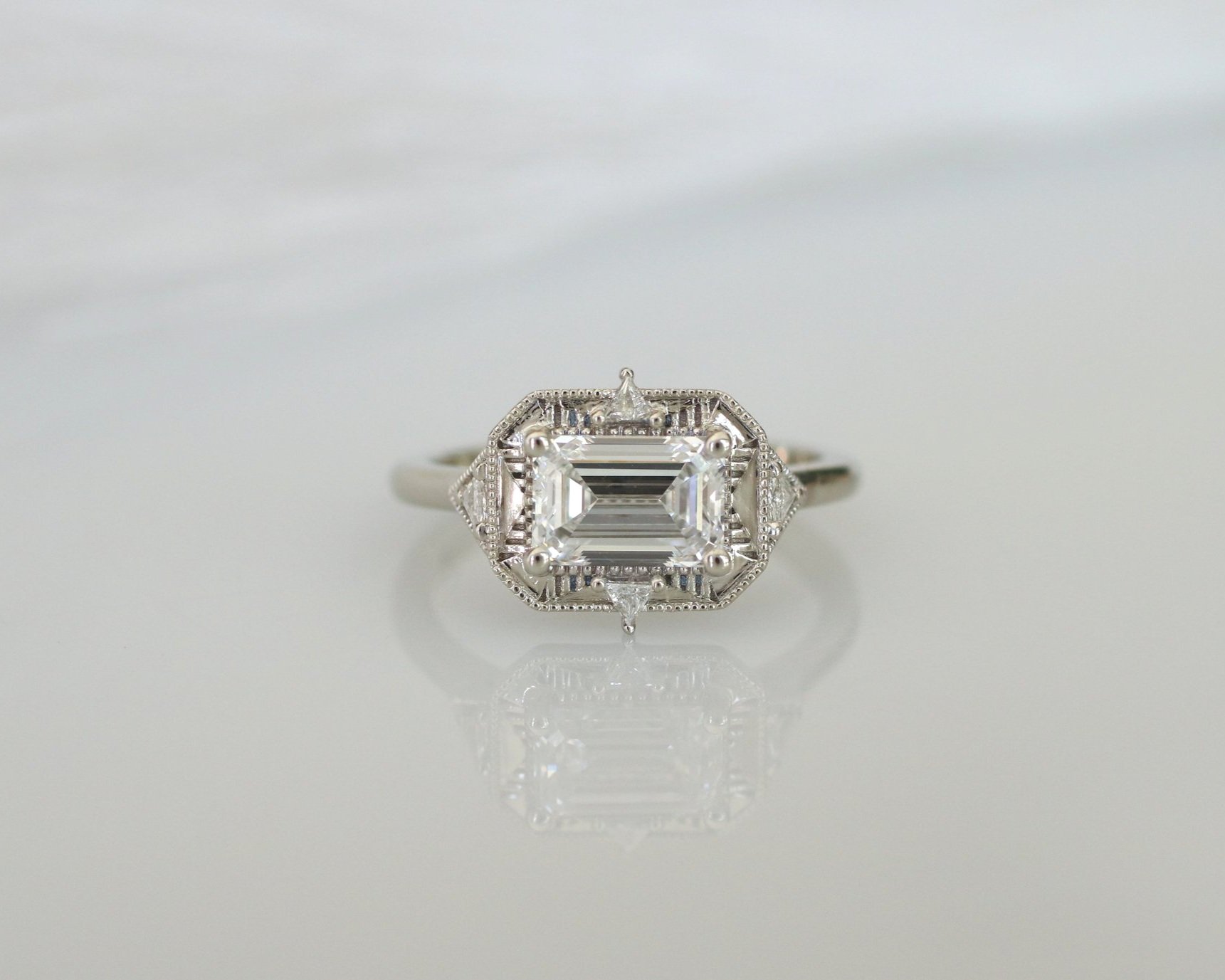 Dorna engagement ring - 1.13ct Emerald cut lab diamond + natural triangle diamonds + 14k white gold