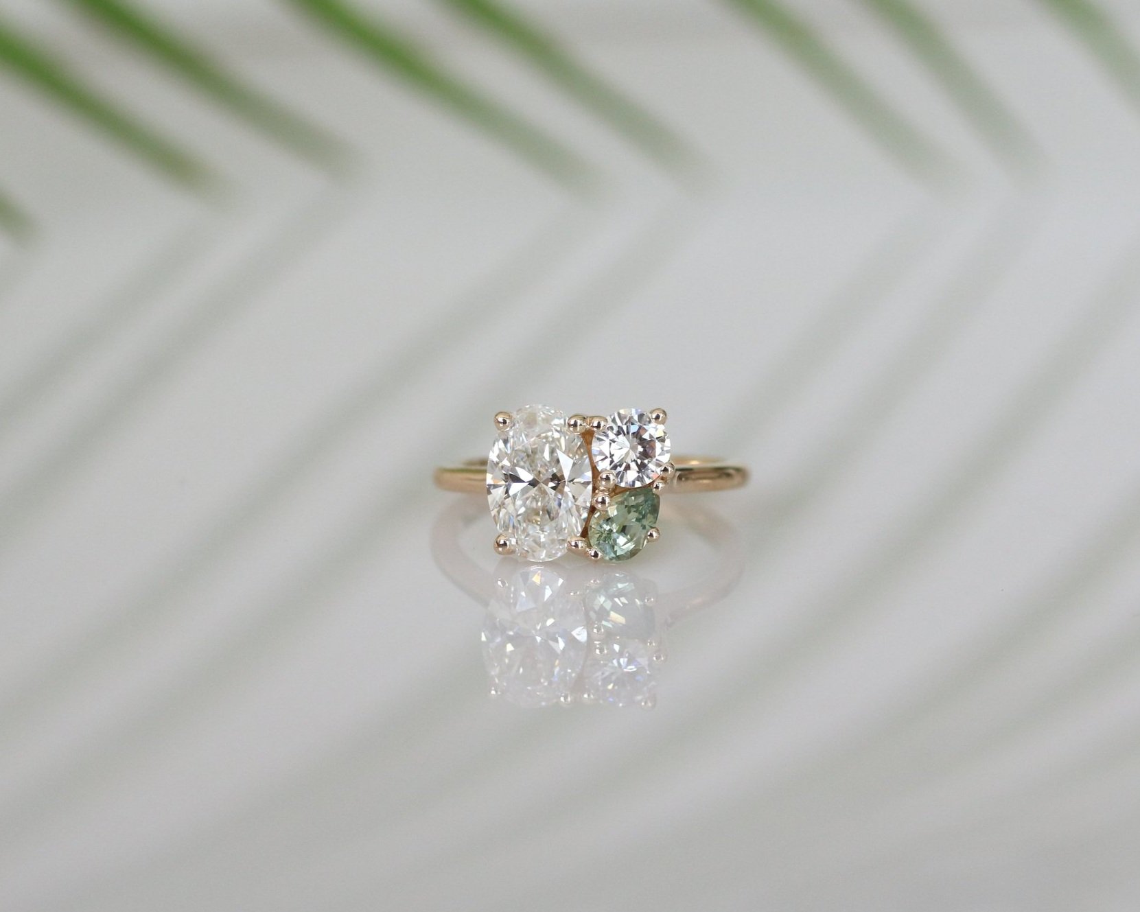 Glennie engagement ring - 1.2ct natural oval diamond + heirloom diamond + green Montana sapphire pear + 14k yellow gold