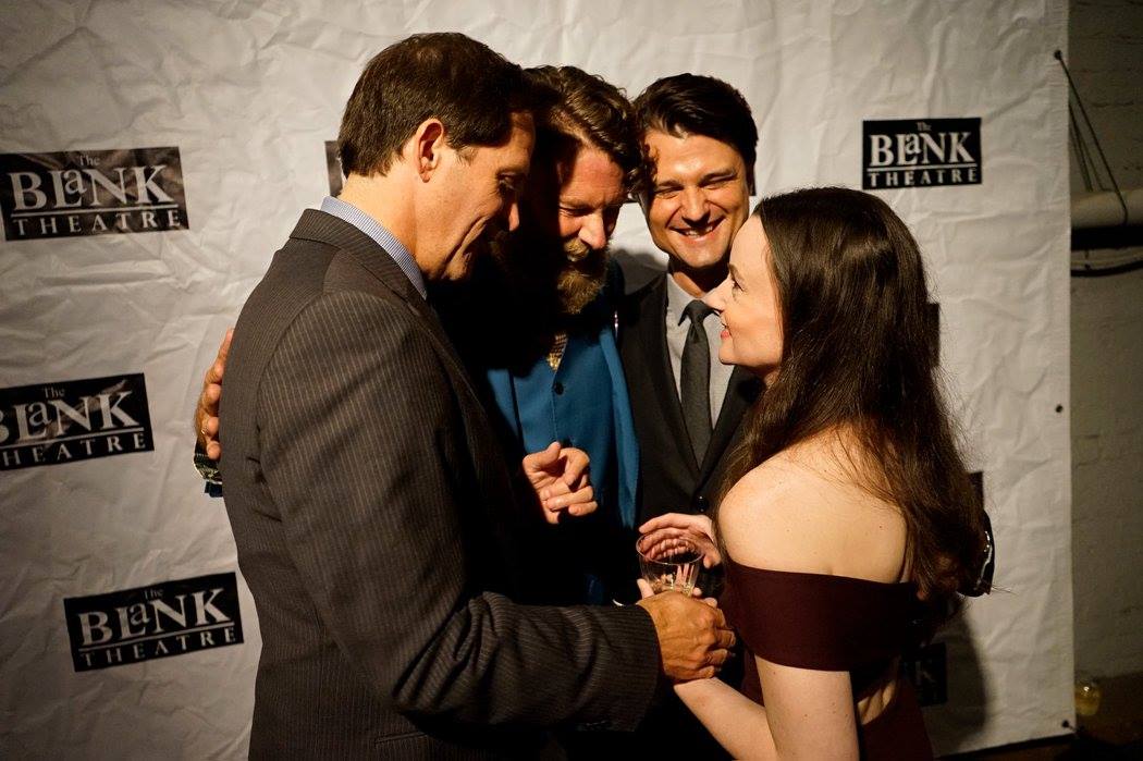 The Tragedy of JFK director Daniel Henning surrounded by The Kennedys on opening night. ( Photo courtesy of Rick Baumgartner.)