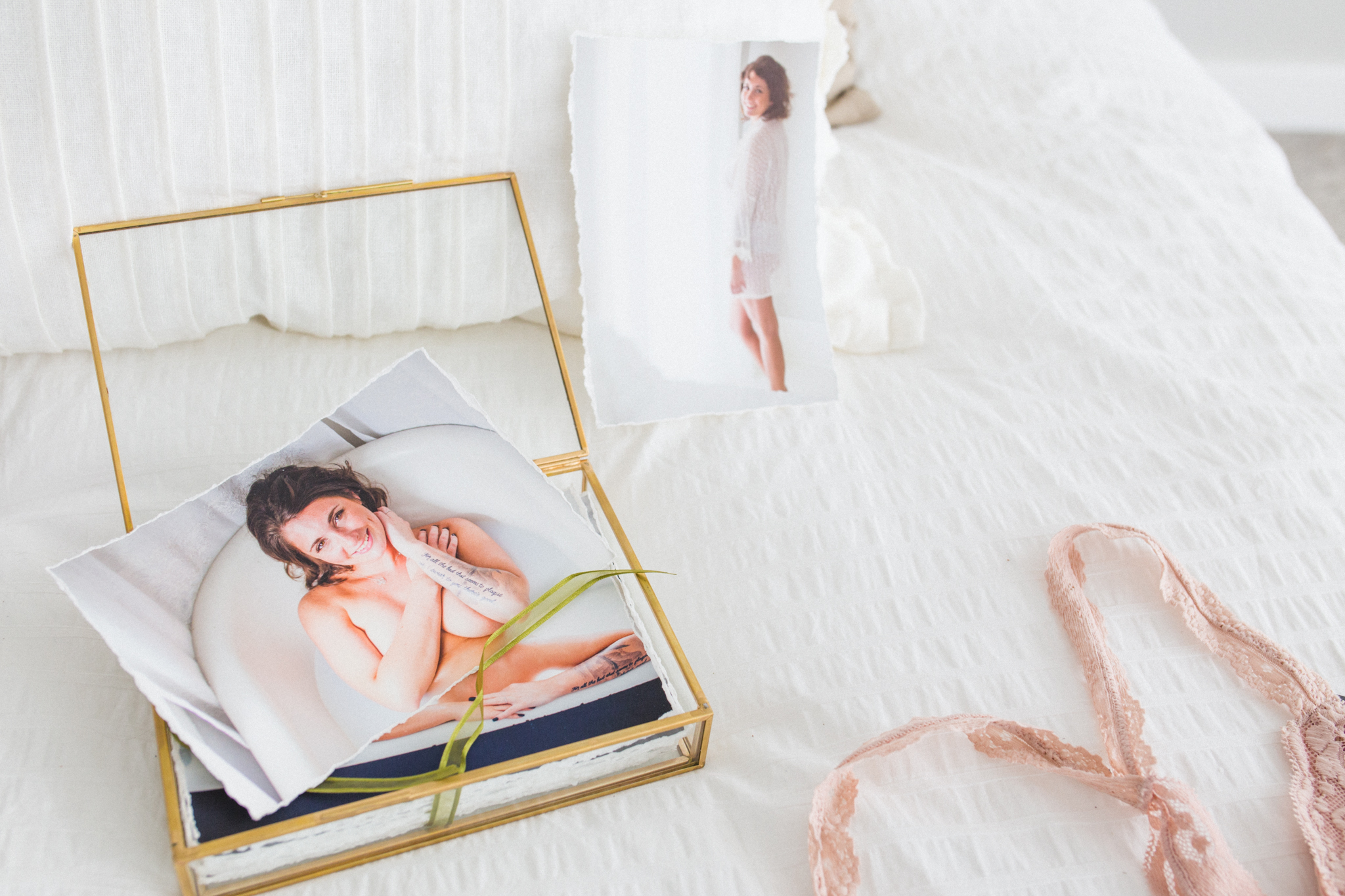 Gold-rimmed glass image boxes contain hand-torn fine art prints from your session.