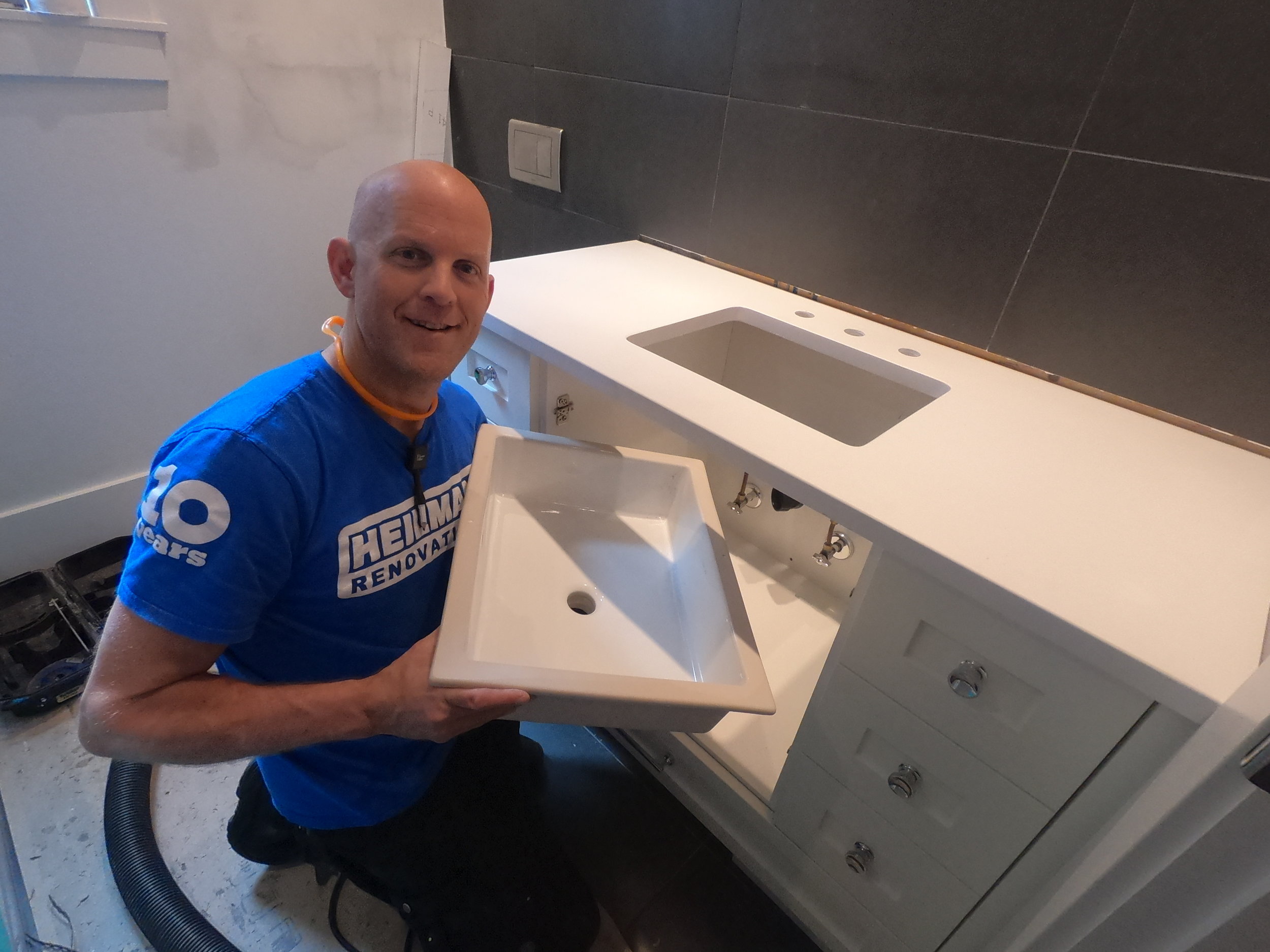 Joe is ready to install a square sink in new vanity