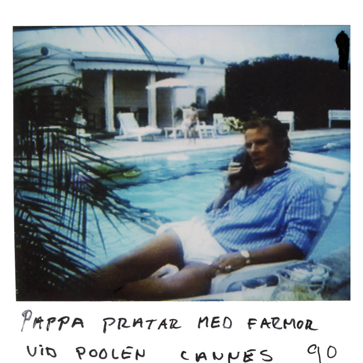 Daddy talks with Granny (on the phone) by the pool in Cannes -90