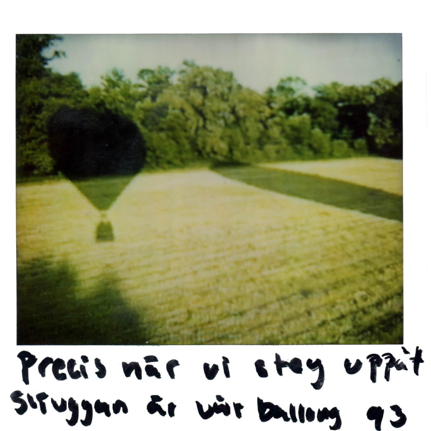 Right when we were lifted up in the air... The shadow is our ballon -93