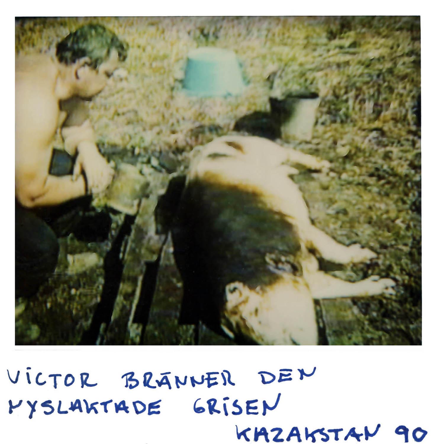 Victor is burning the freshly slaughtered pig Kazakhstan -90
