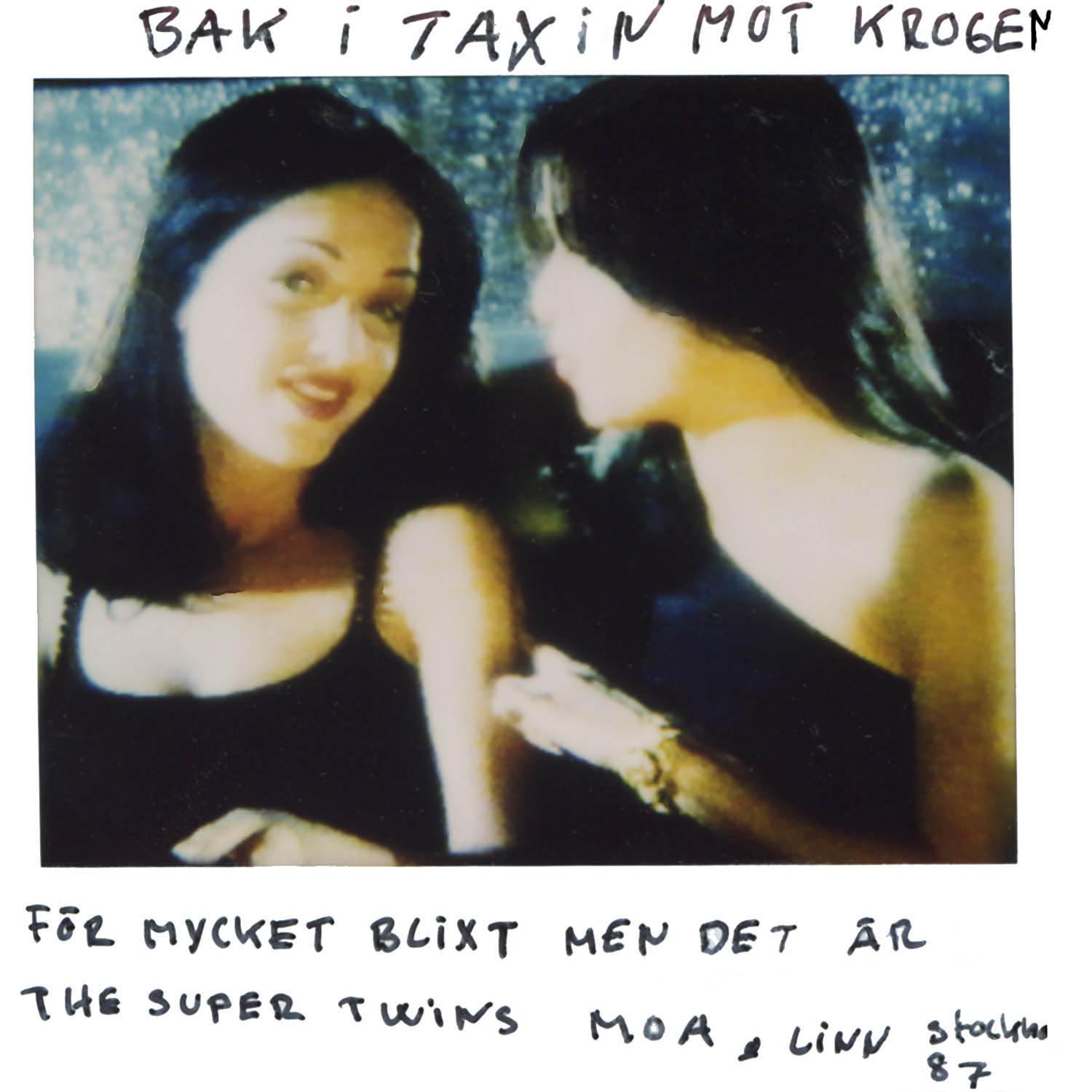The super twins Moa and Linn in the rear seat of the cab on the way to the restaurang (to much flash) Stockholm -87