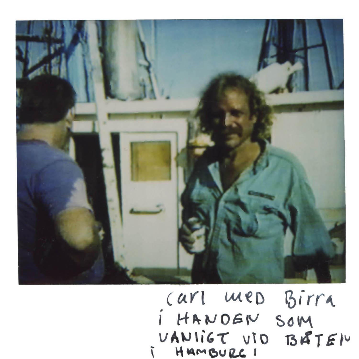 Carl with a bear can in his hand (as usual) On the boat in Hamburg