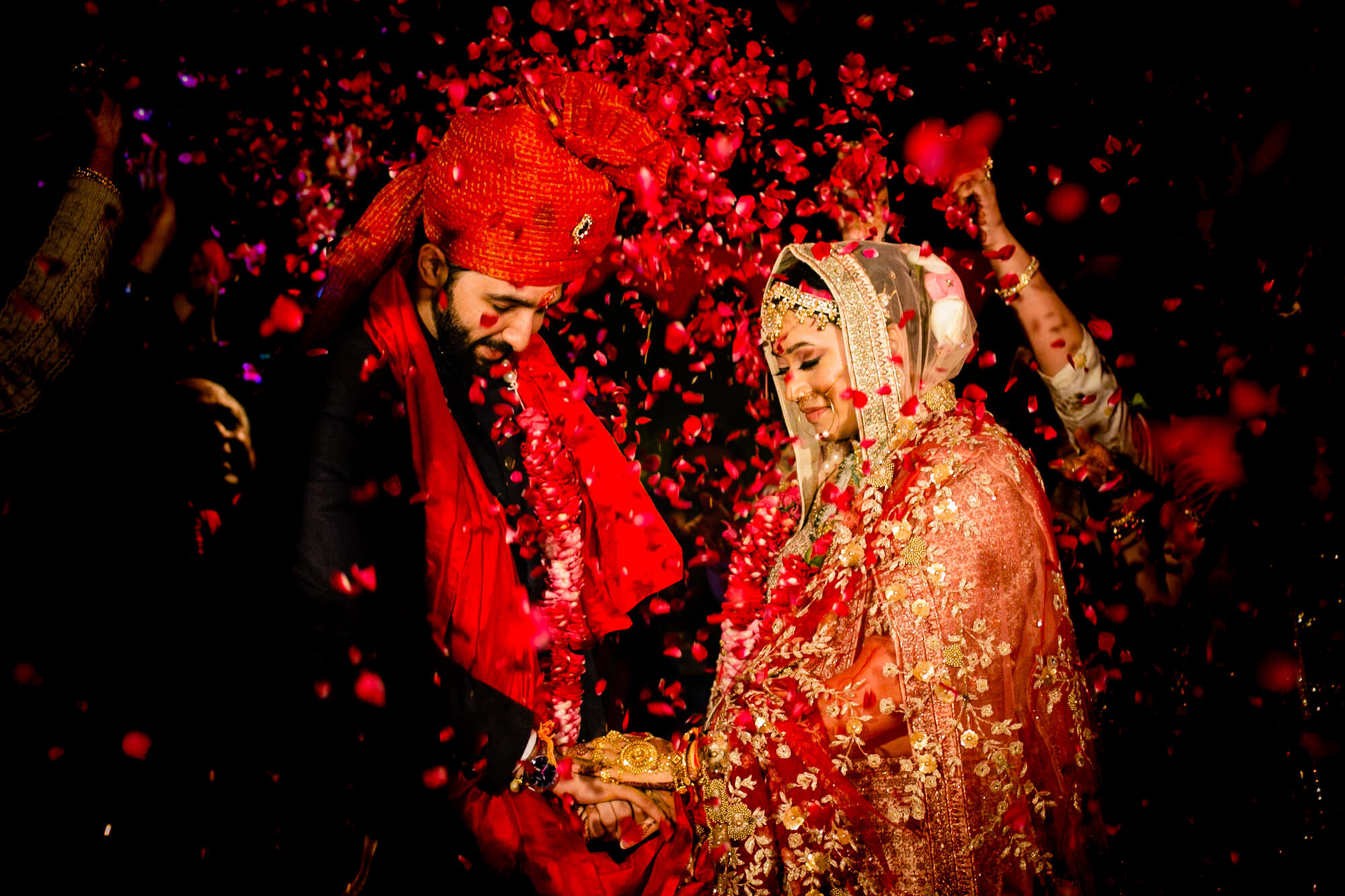 As Akshita &amp; Animesh's marriage ceremony concludes, the priest asks their families to shower petals on them