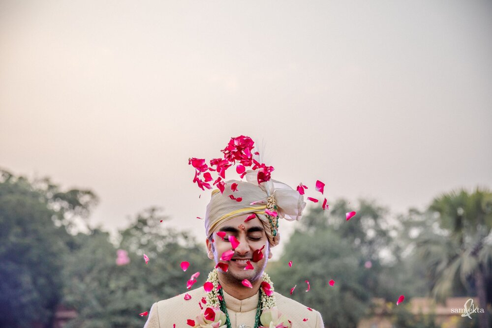 It was Shivam's turn to experience a tiny flower shower, before these two walked to their mandap, family &amp; friends in tow