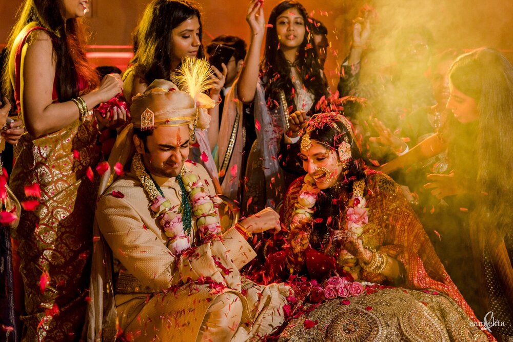 Shivam was clearly surprised with the amount of flowers coming his way from their families, as they completed their wedding vows