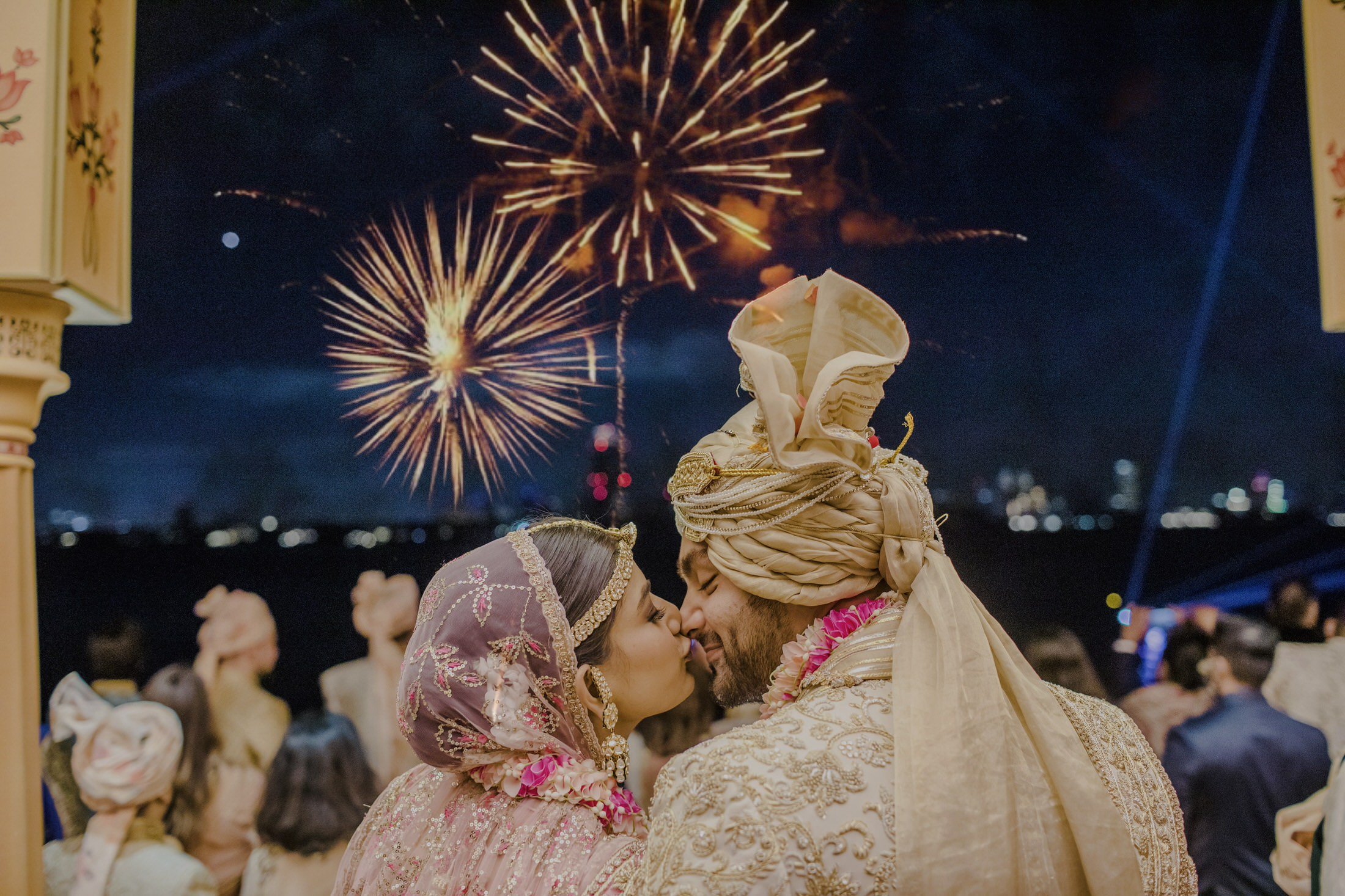 Vanshika &amp; Aneesh do a version of an Eskimo kiss as a thousand fireworks light up the sky at The Raffles, Palm Jumeirah
