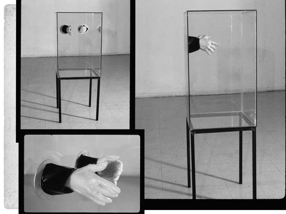 Hands in Glass Box.jpg