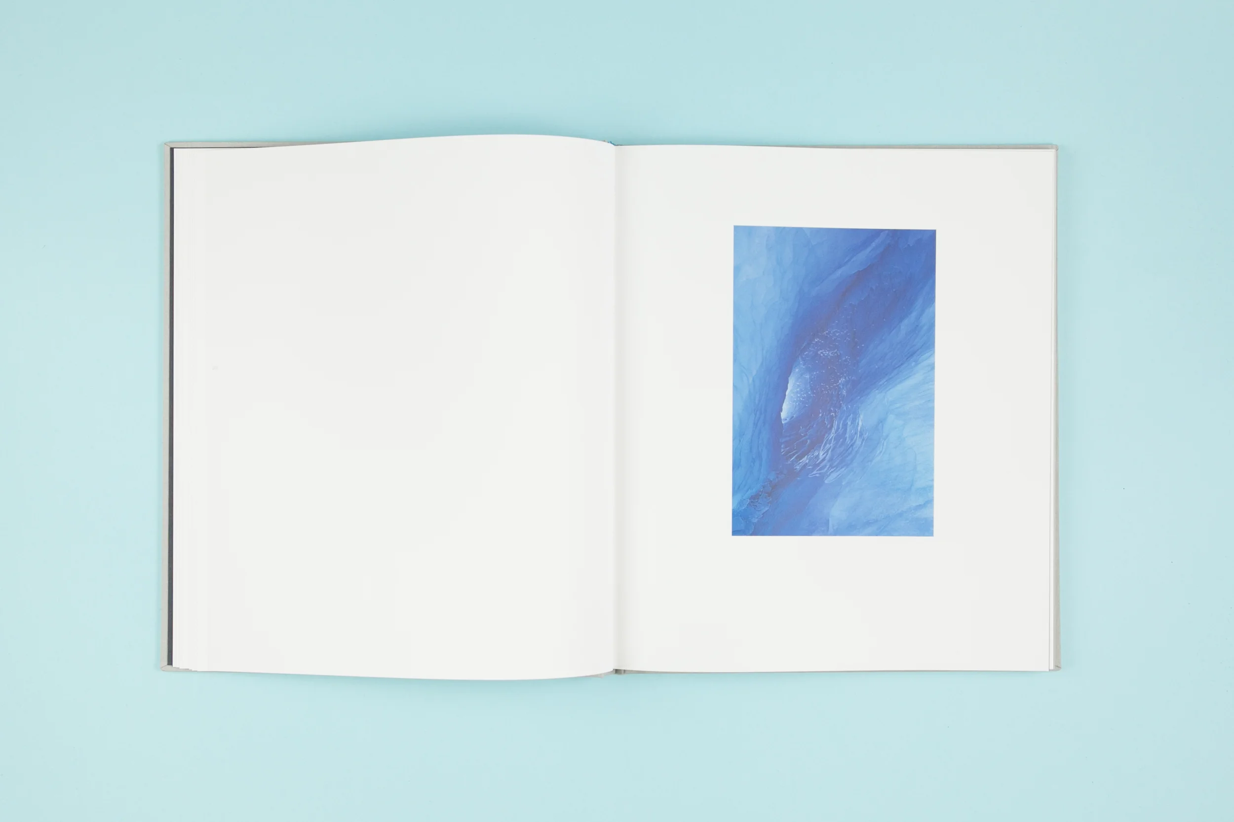Book spread from self-published photobook 'Out of Thin Air' featuring photography by Daragh Muldowney and design by Read That Image.