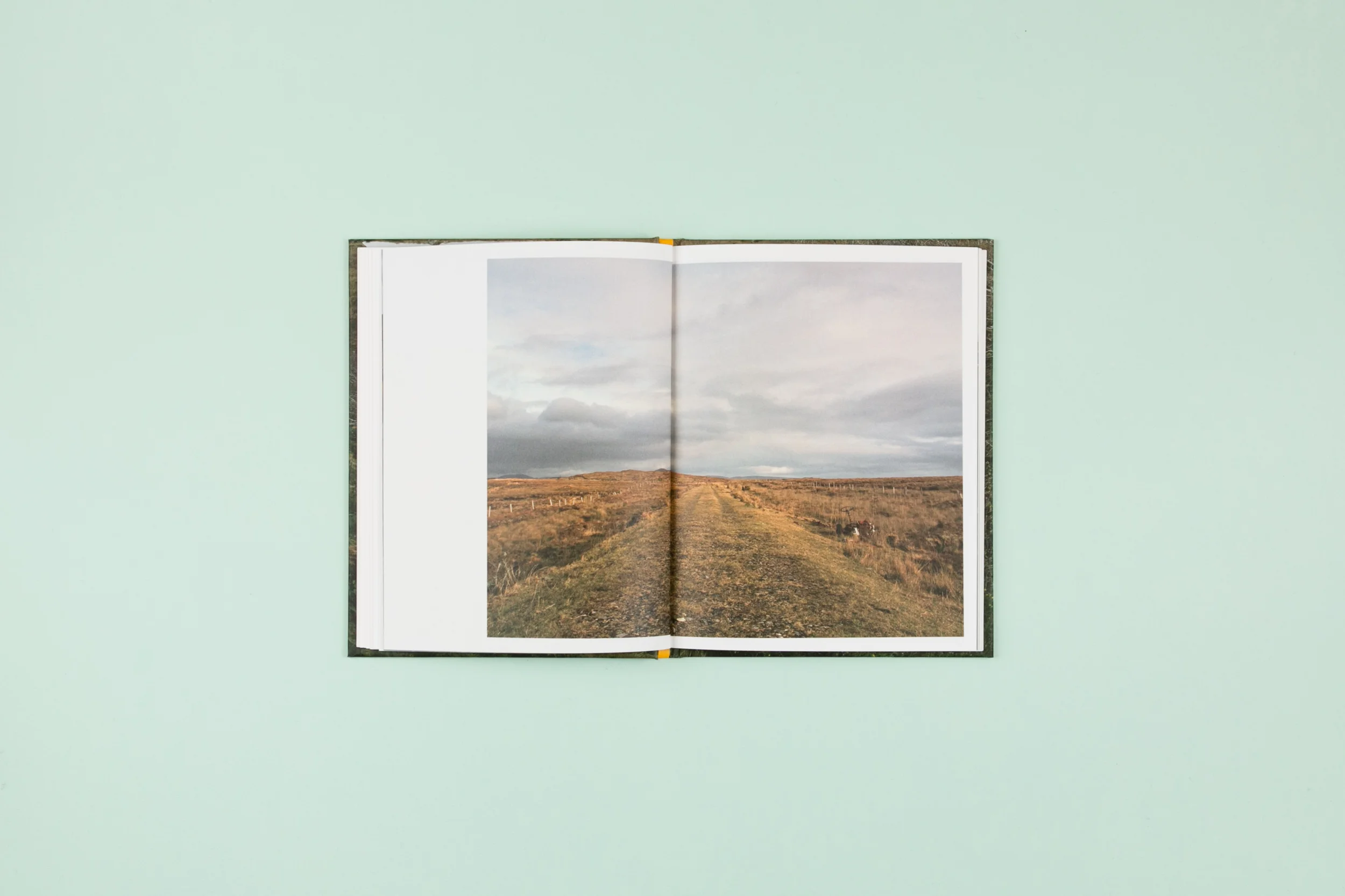 Book spread from 'The Whistle Blowing', a photobook featuring photography by Lorraine Tuck. Self-published and designed in collaboration with Read That Image.
