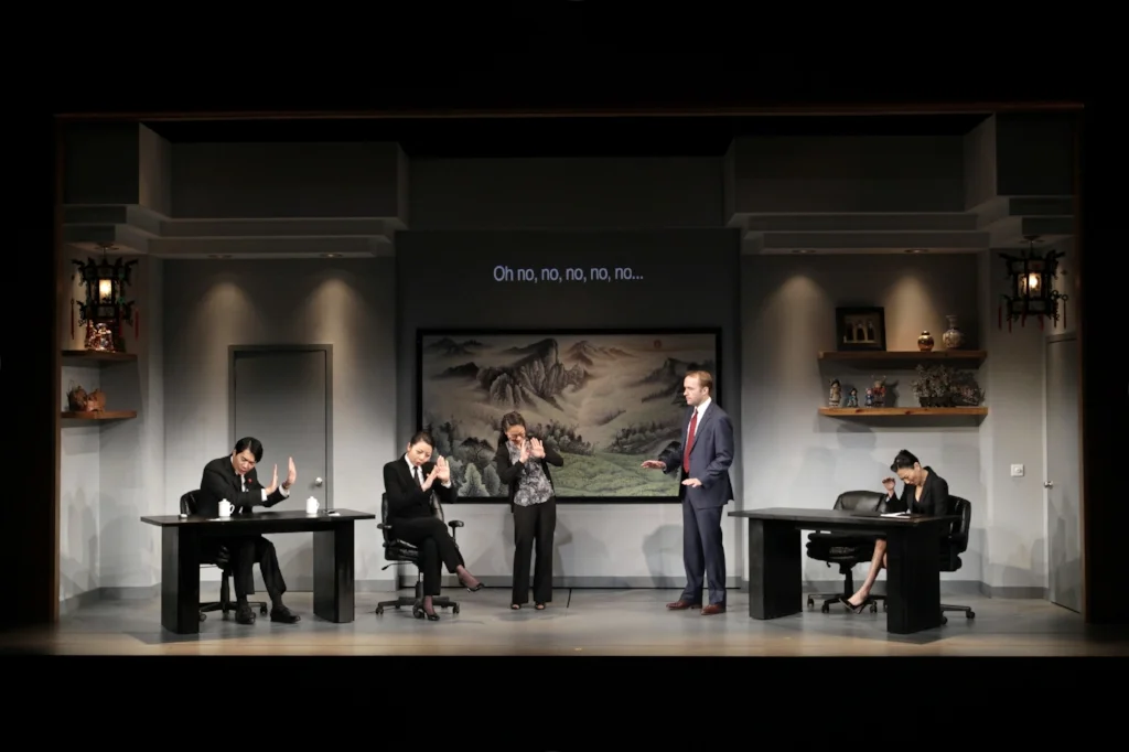 The city is building a new cultural center, and Cavanaugh is selling his ability to both manufacture the signage and ensure that the English translations are correct. With the help of a Western expatriate as his business consultant, he negotiates the tricky waters of Chinese business etiquette, but he must handle the romantic customs on his own.