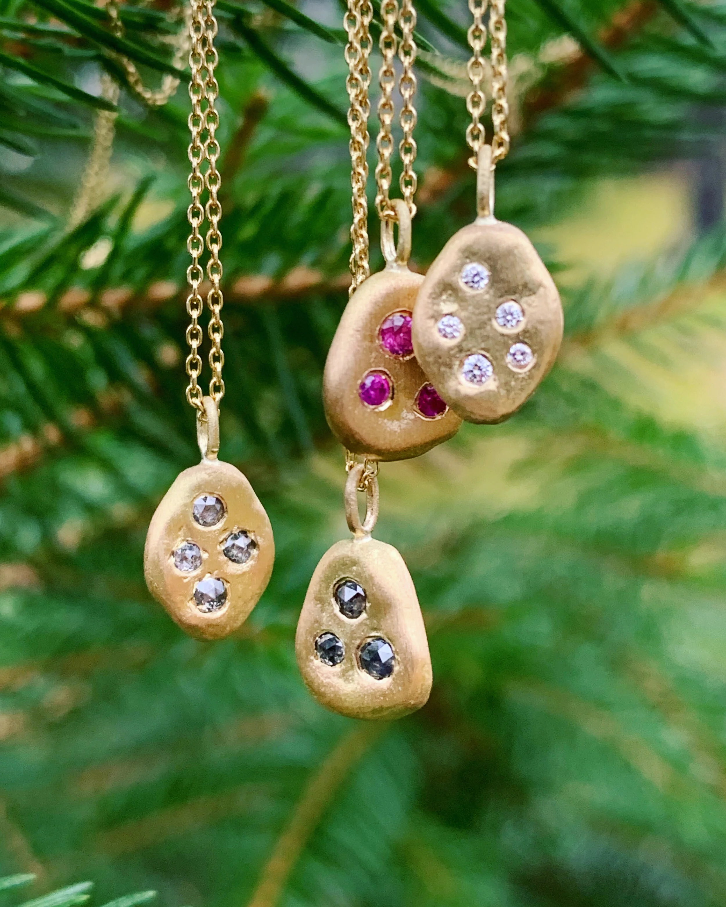 18k Skipping Stone Pendants