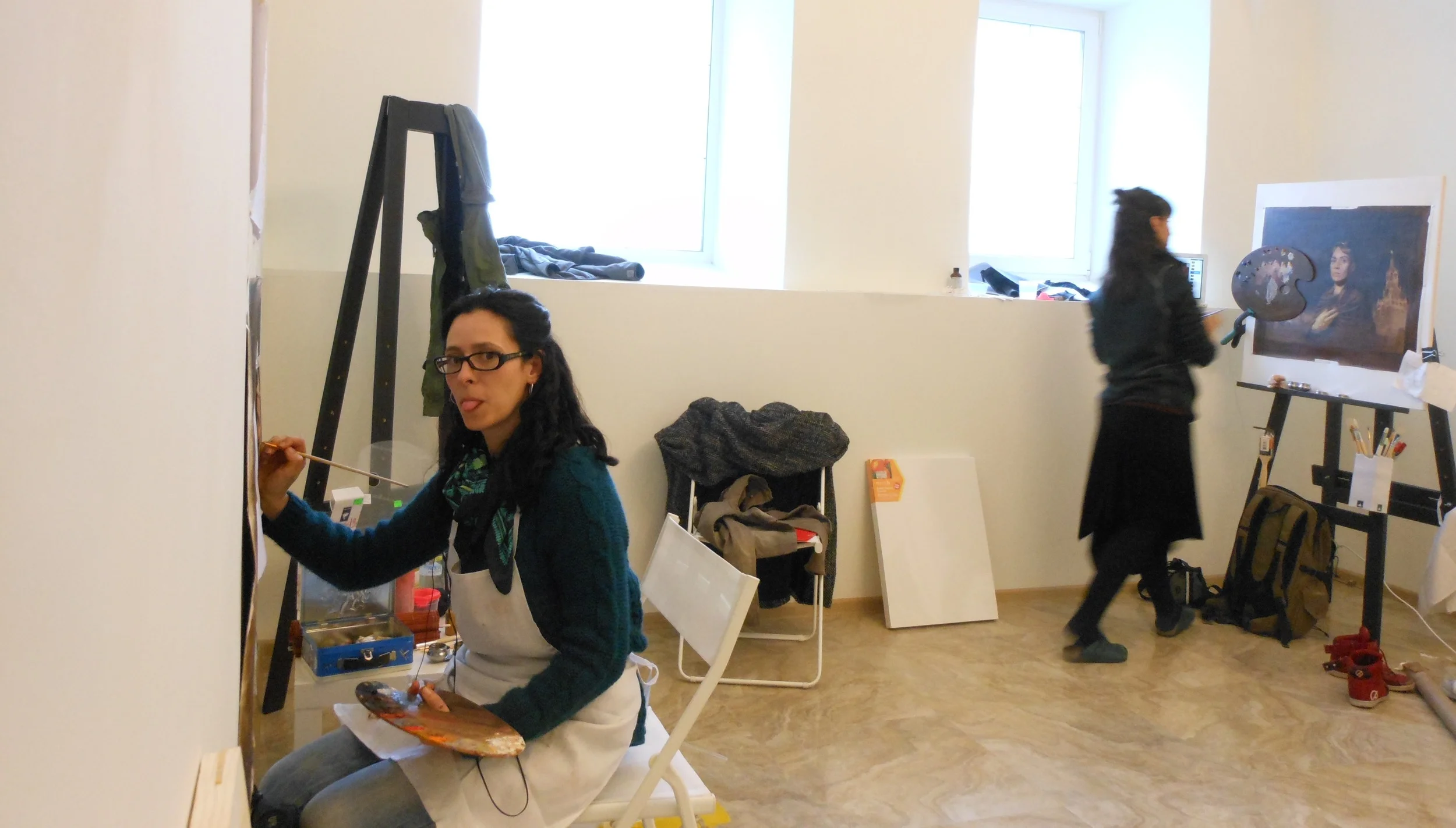 painting in the studio, alongside Arantza MARTINEZ
