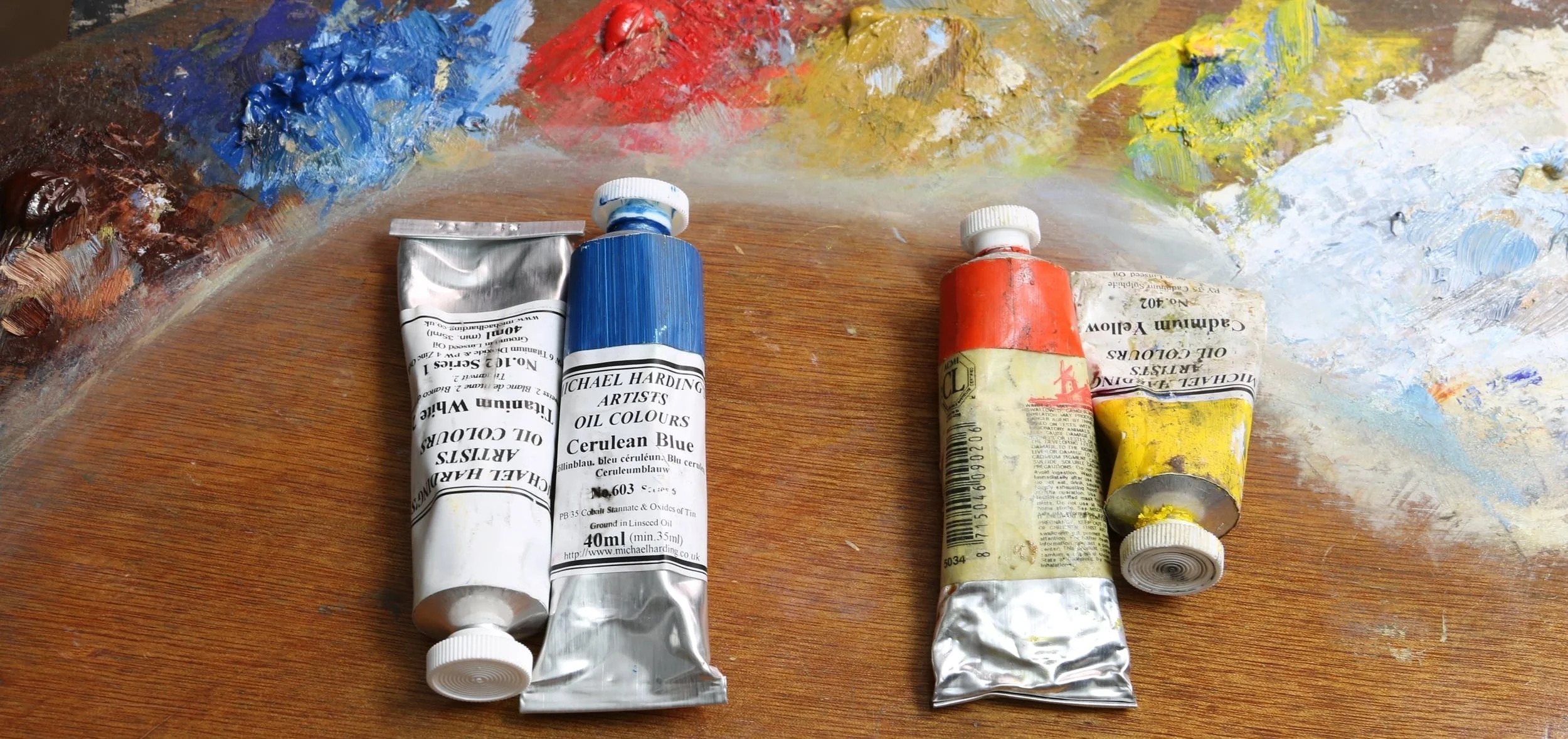 Titanium white & Cerulean blue vs Cadium red & Cadium yellow. (paint from Michael Harding)
