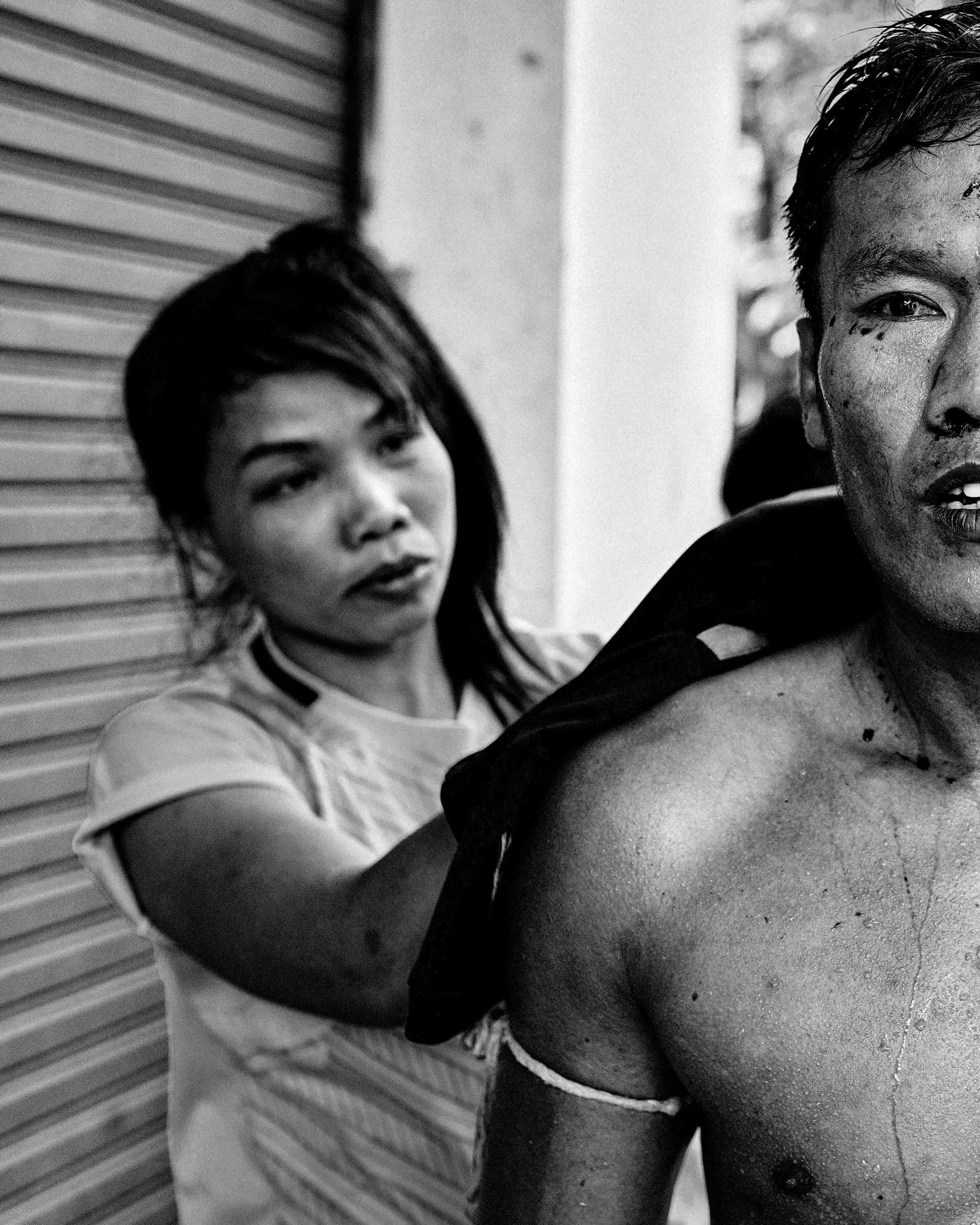 A Burmese fighter regains consciousness after a KO during a Muay Kard Chuek bout &mdash; fought with rope-bound hands &mdash; against a Thai opponent in the gritty Thai&ndash;Burmese border town of Mae Sot (2015). #muaykardchuek #muaythai #maesot