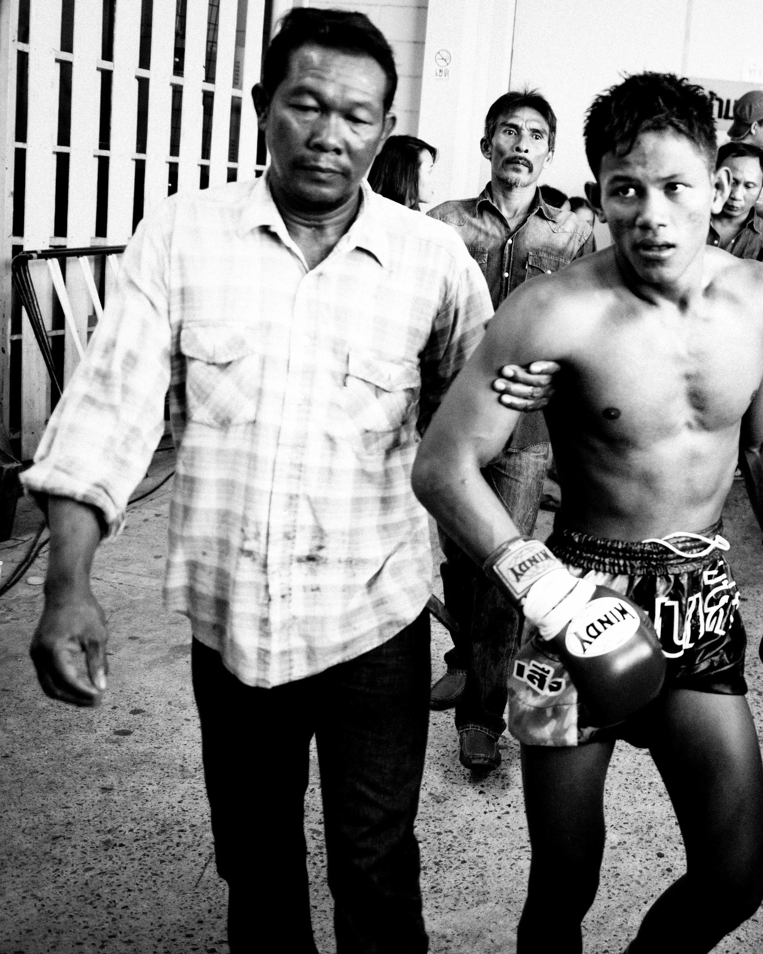 A fighter is dragged away from the ring after a defeat at the Channel 7 stadium. #muaythai