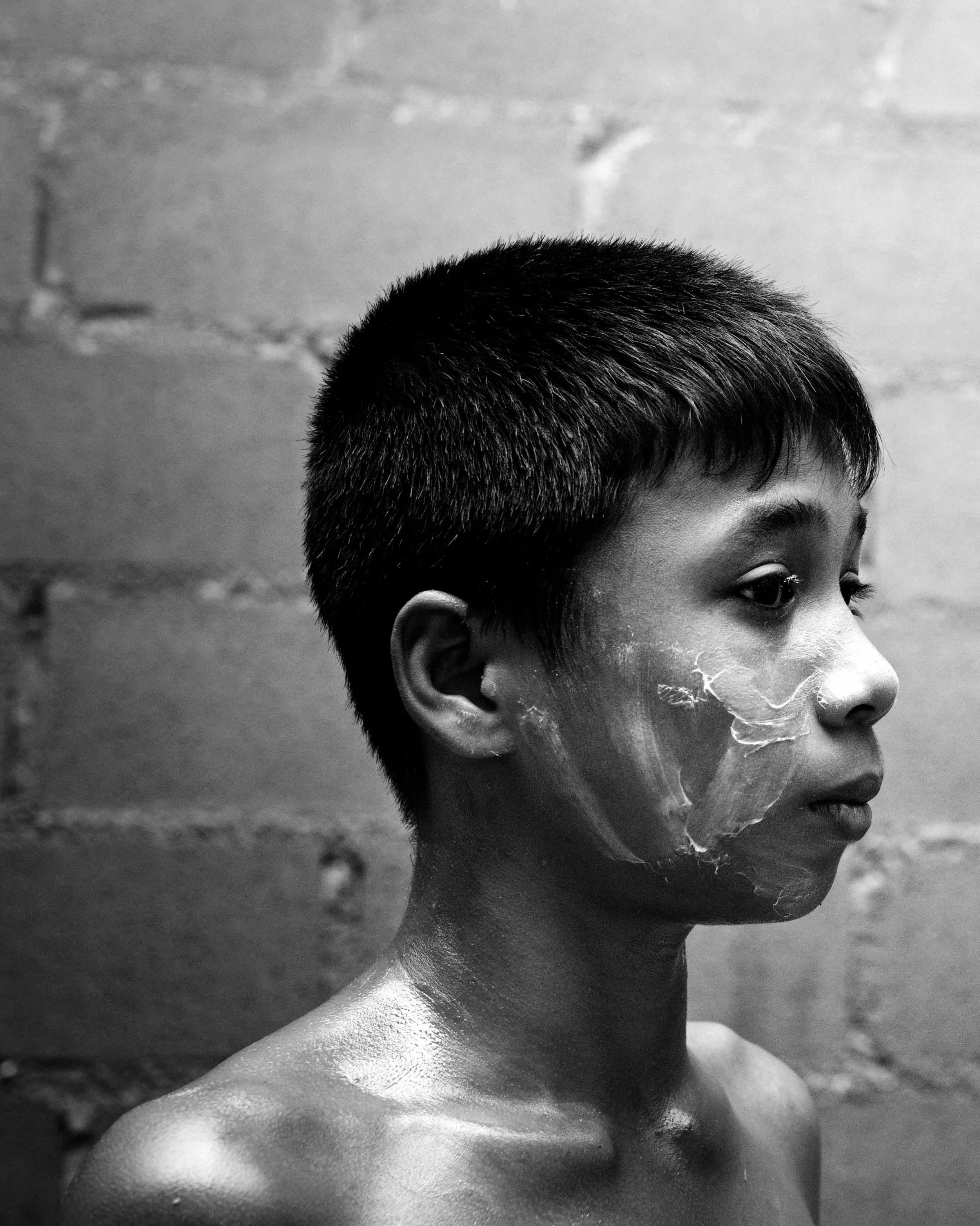 A fighter is in a pensive mood in the dressing room before his upcoming fight. #muaythai