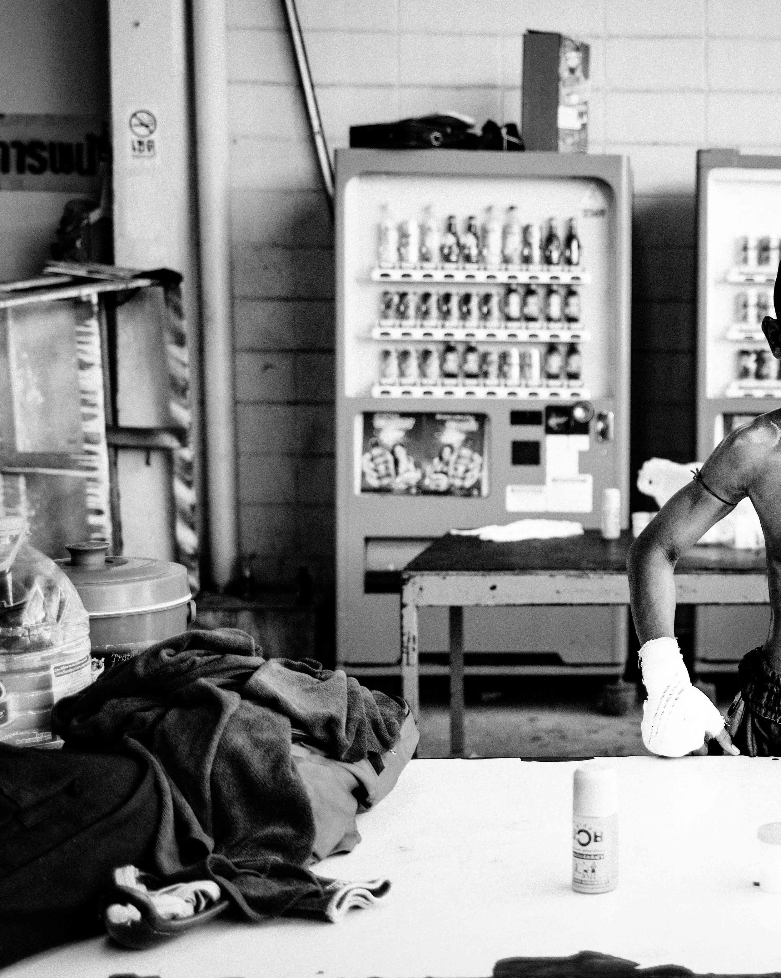 A young fighter noticed my camera as he awaits his bout at the Channel 7 stadium. #muaythai
