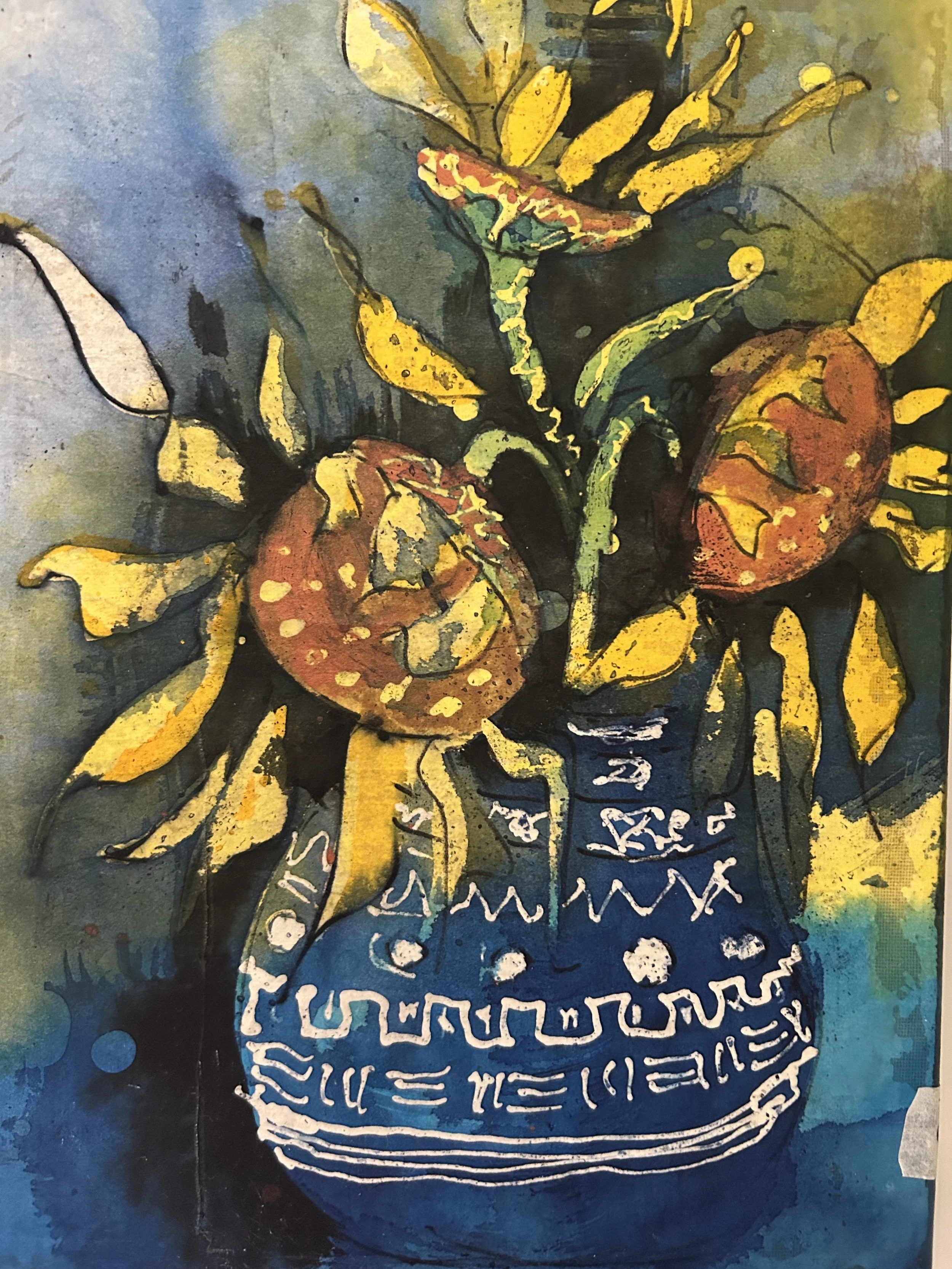 Sunflowers in blue and white vase