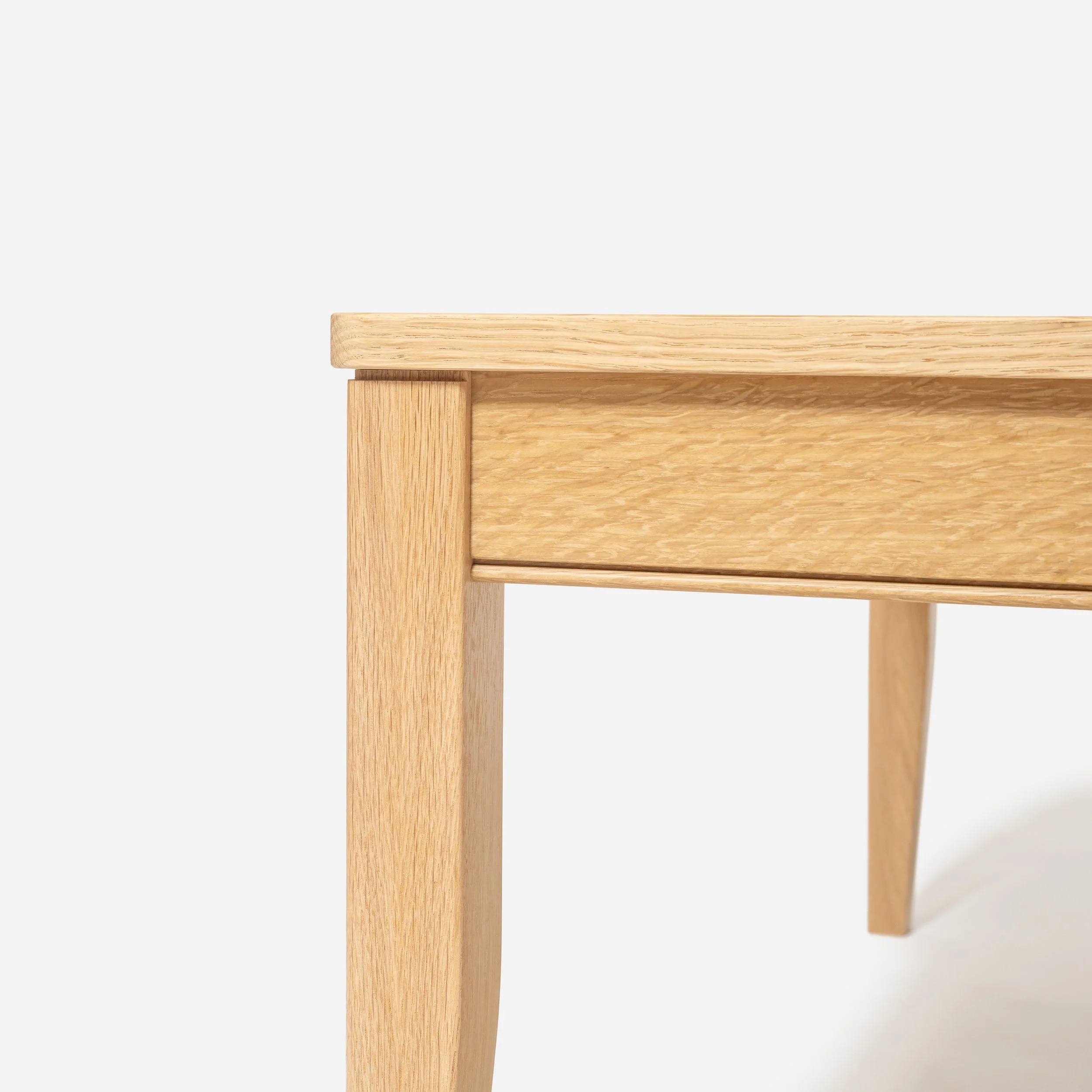 Handcrafted Velora Coffee Table made from premium white oak with natural finish, modern design, traditional joinery, and ample tabletop space, made in Milwaukee.