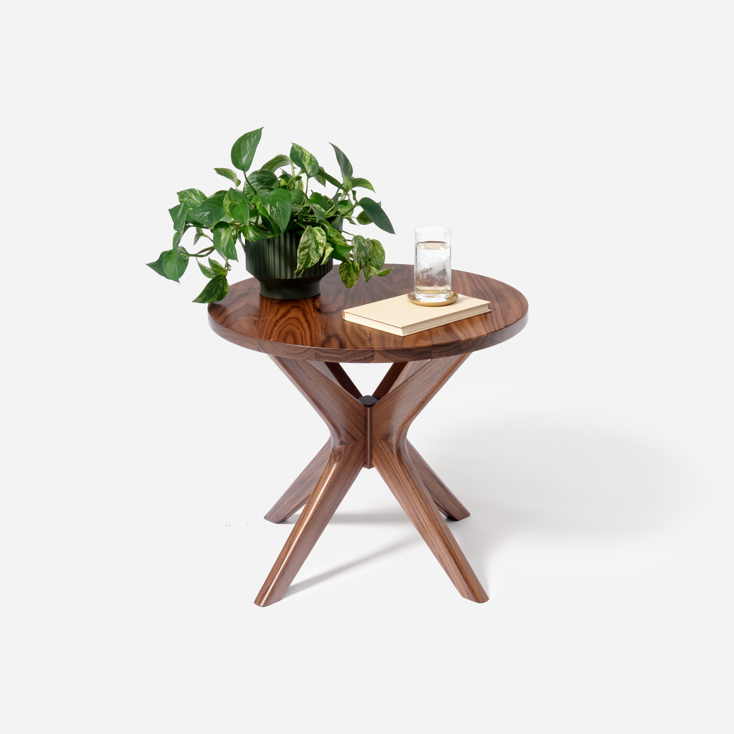 Handcrafted Mid Modern Side Table made from walnut wood with round design, mid-century modern influence, and expert craftsmanship, versatile and stylish, made in Milwaukee.