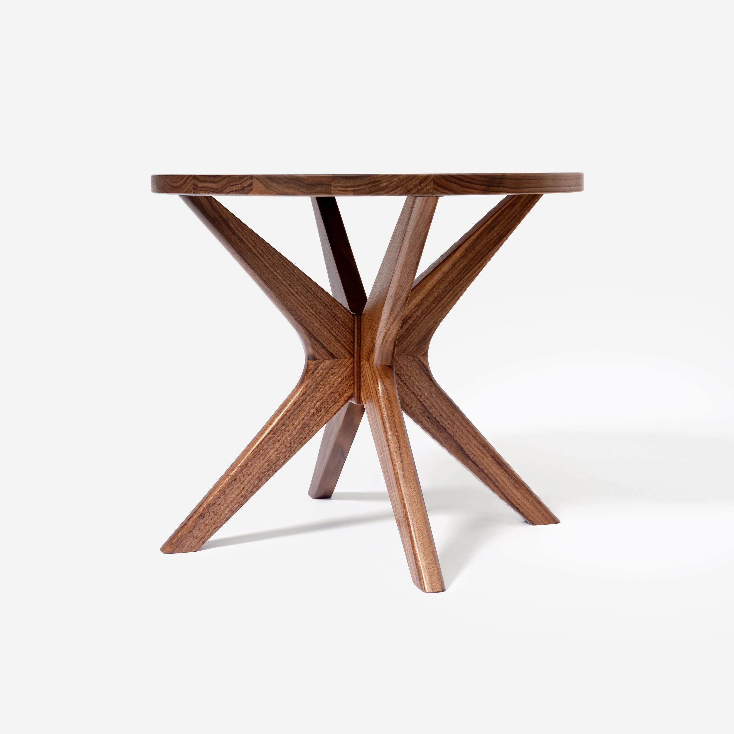 Handcrafted Mid Modern Side Table made from walnut wood with round design, mid-century modern influence, and expert craftsmanship, versatile and stylish, made in Milwaukee.