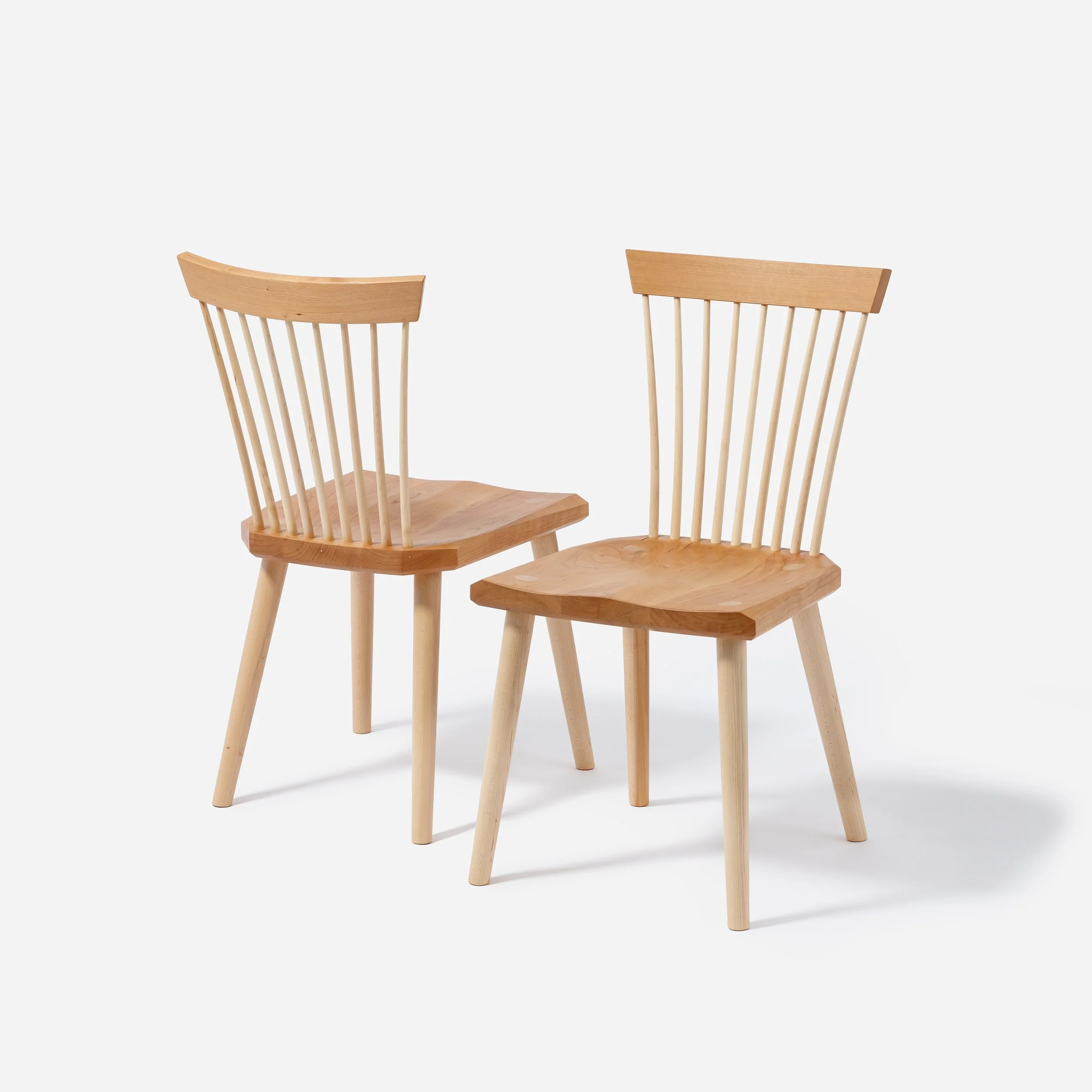 Handcrafted Spindle Back Chair made from cherry wood, offering a sturdy base and timeless aesthetic, made in Milwaukee.