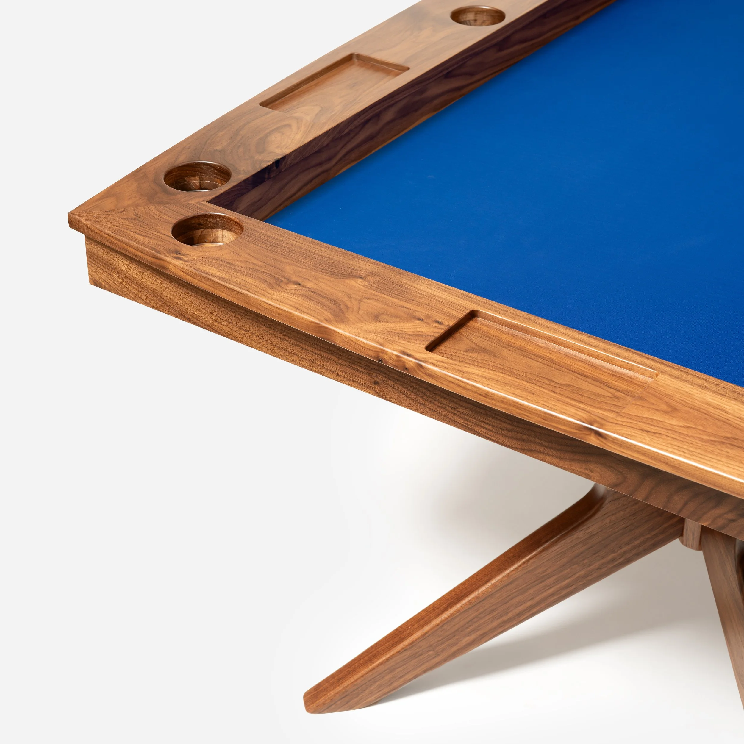 Bold blue game board inset — framed by warm walnut surround