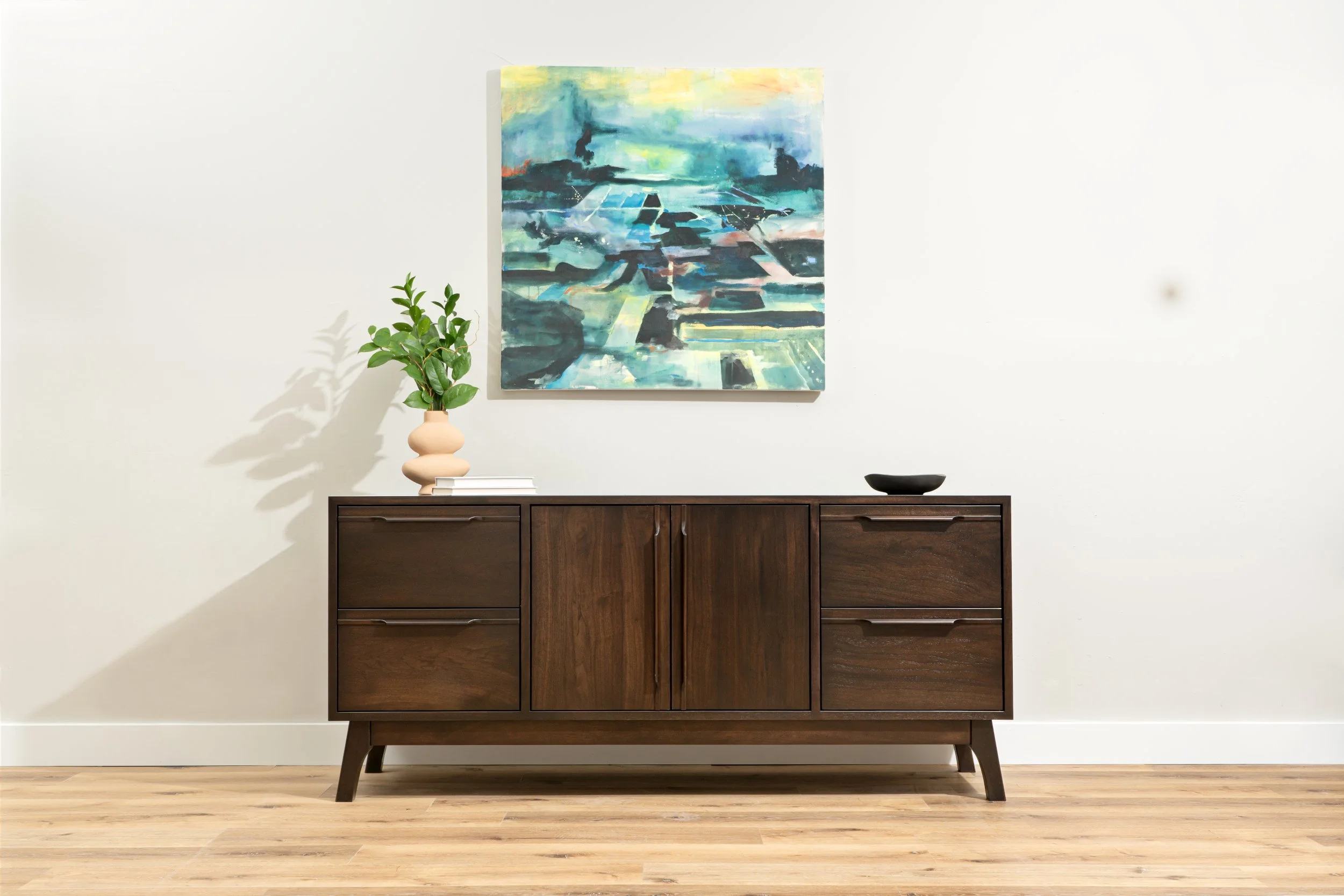 solid walnut credenza – long low profile – flush drawers and doors with carved pulls