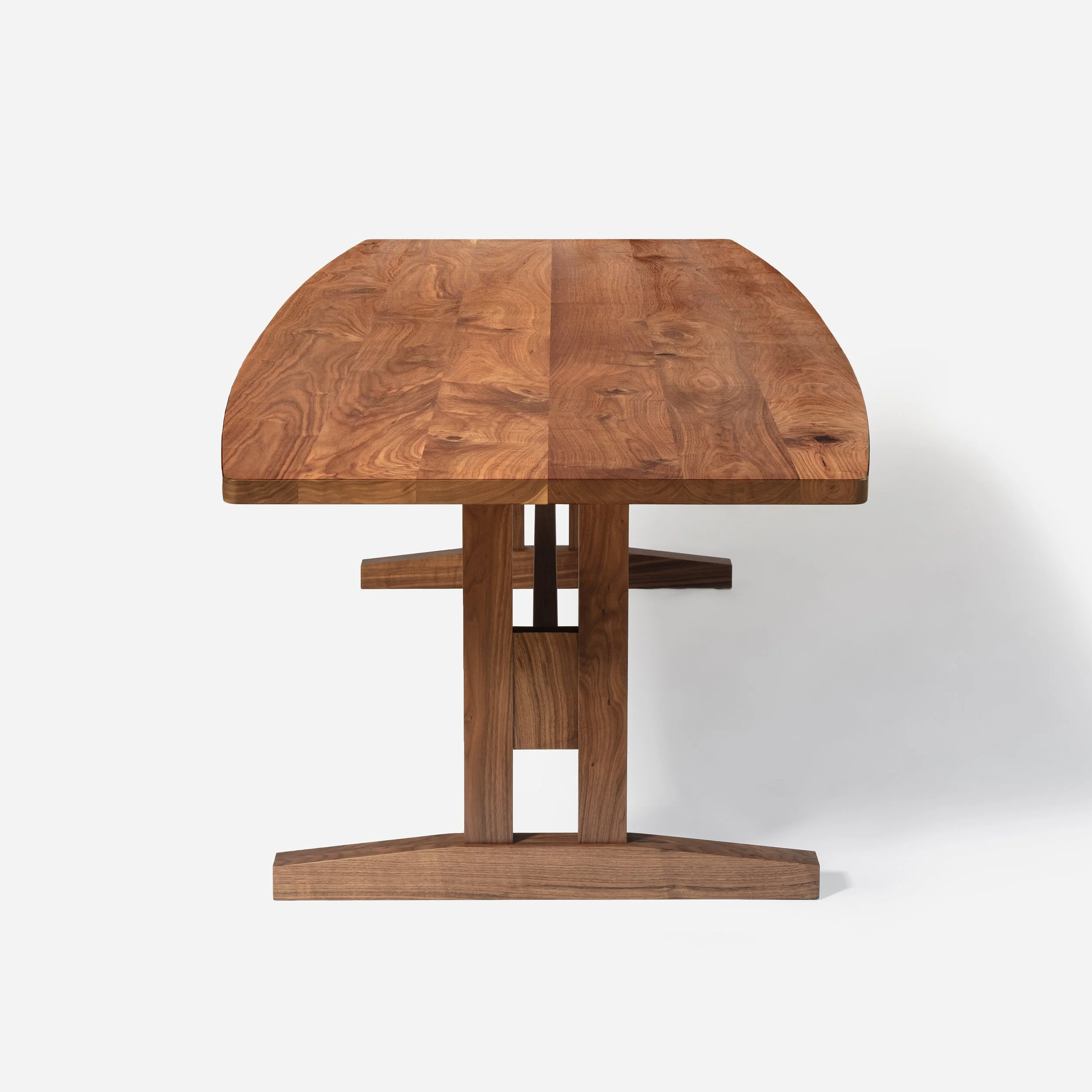 Handcrafted Concord Table made from walnut wood, inspired by Shaker craftsmanship with balanced proportions and traditional joinery, timeless design, made in Milwaukee.