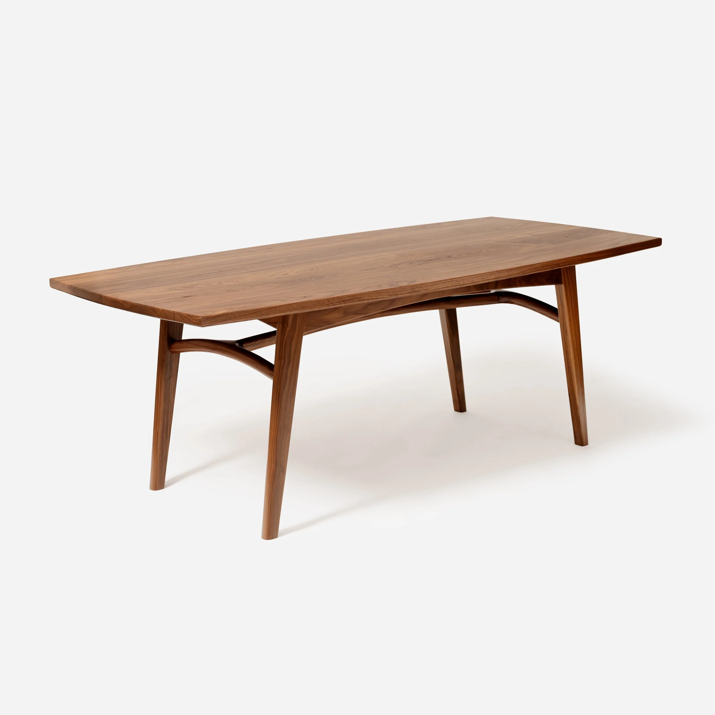 Sustar Woodworks mid-century modern solid walnut dining table featuring a grain-matched tabletop and splayed legs