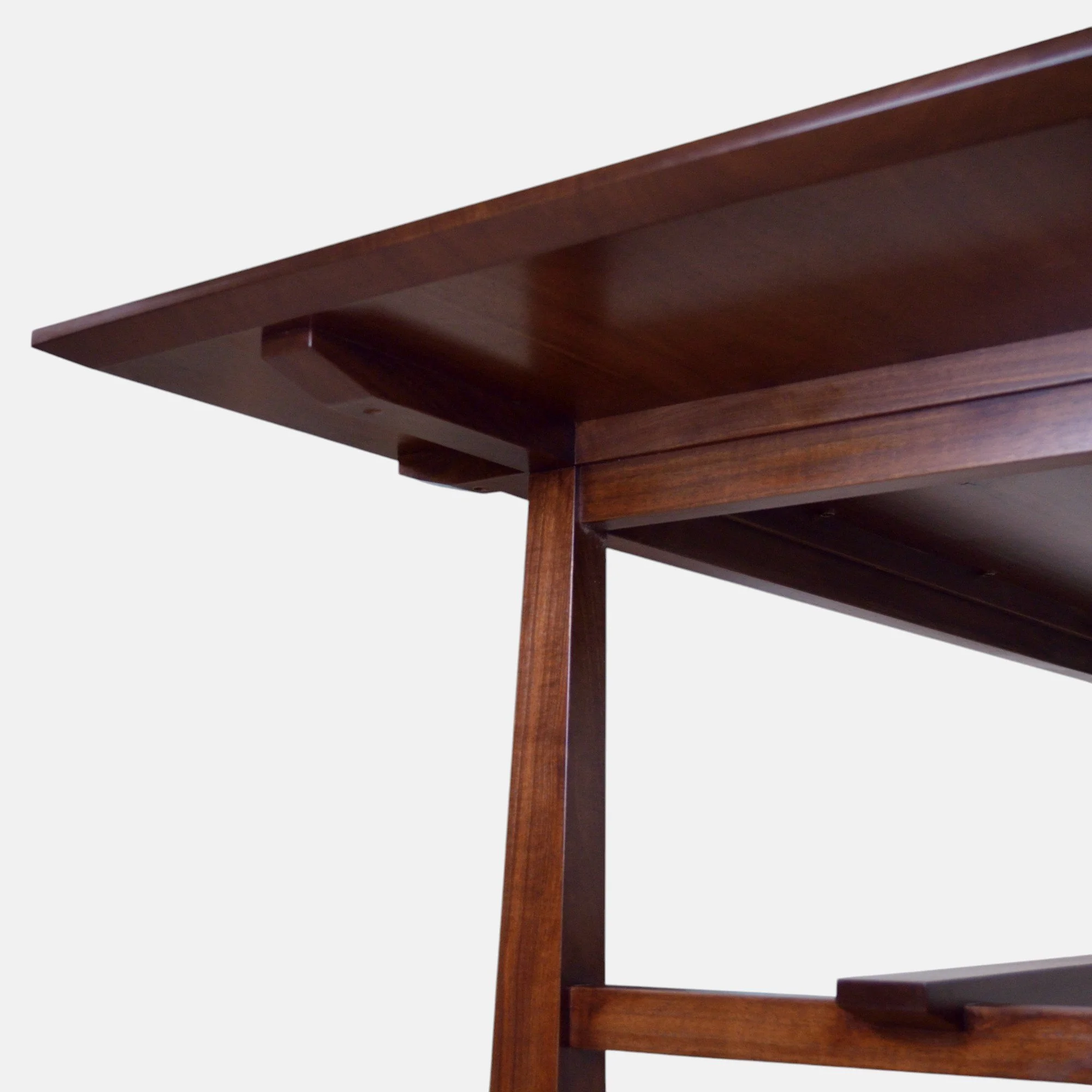Handcrafted Milwaukee Bungalow Table made from rich walnut wood, inspired by early 20th-century design, blending classic and modern elements with expert craftsmanship, made in Milwaukee.