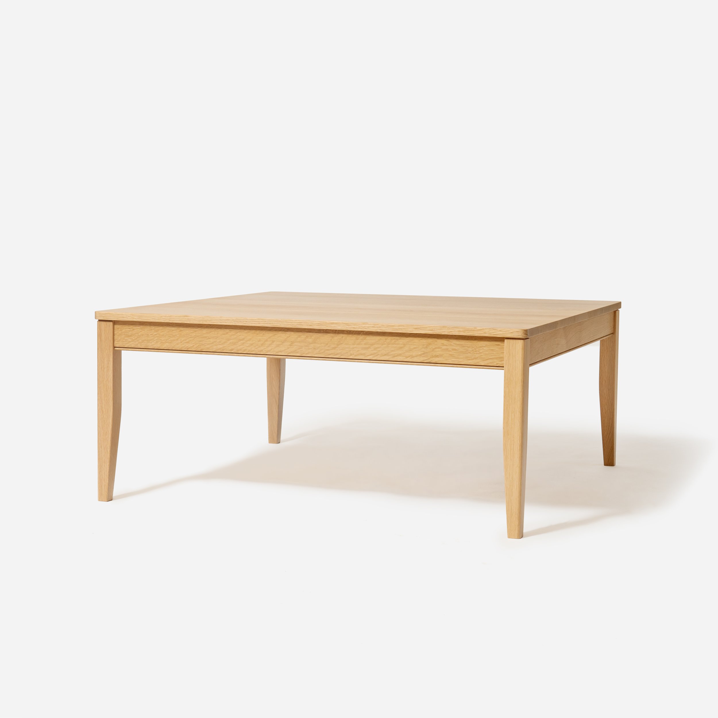 Handcrafted Velora Coffee Table made from premium white oak with natural finish, modern design, traditional joinery, and ample tabletop space, made in Milwaukee.