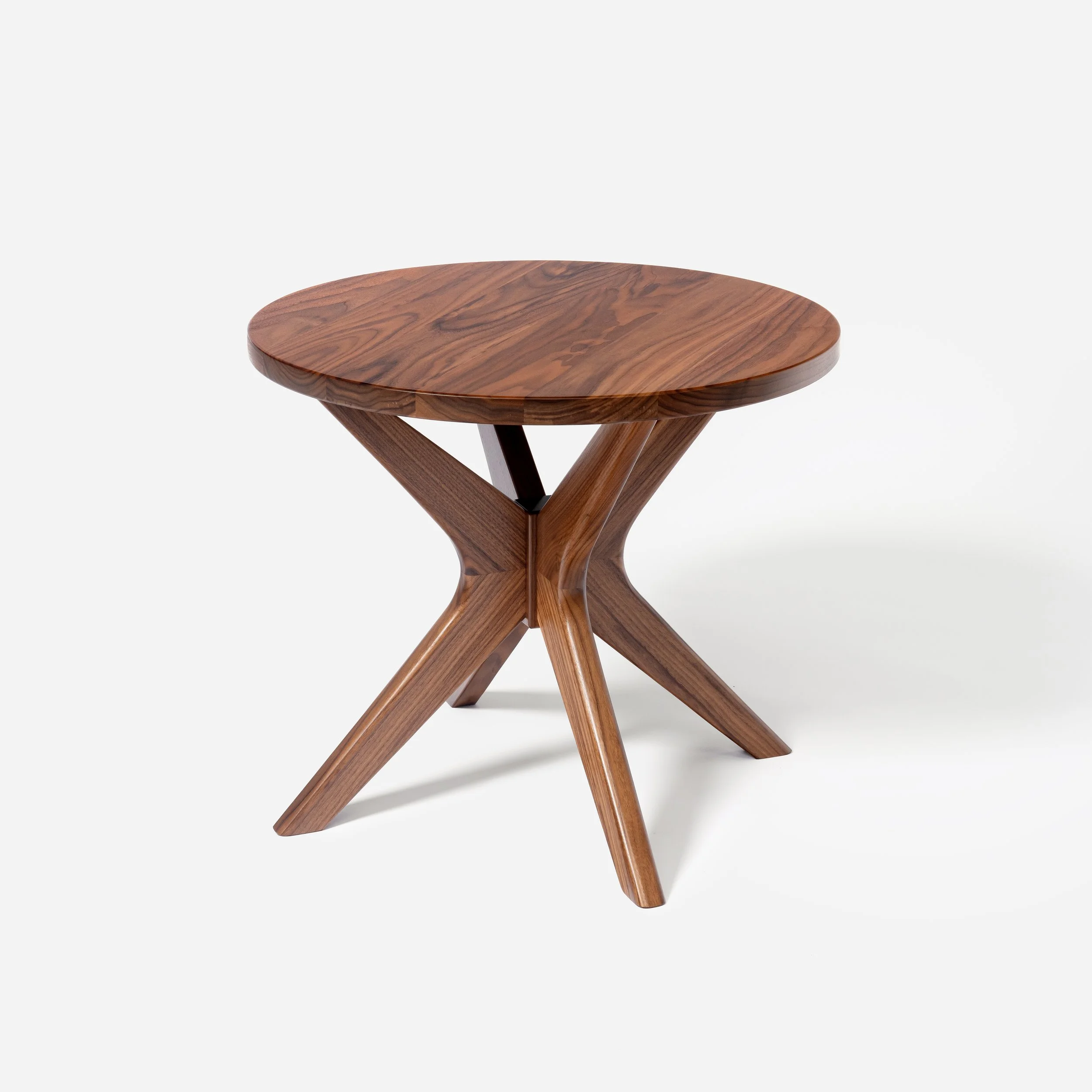 Handcrafted Mid Modern Side Table made from walnut wood with round design, mid-century modern influence, and expert craftsmanship, versatile and stylish, made in Milwaukee.