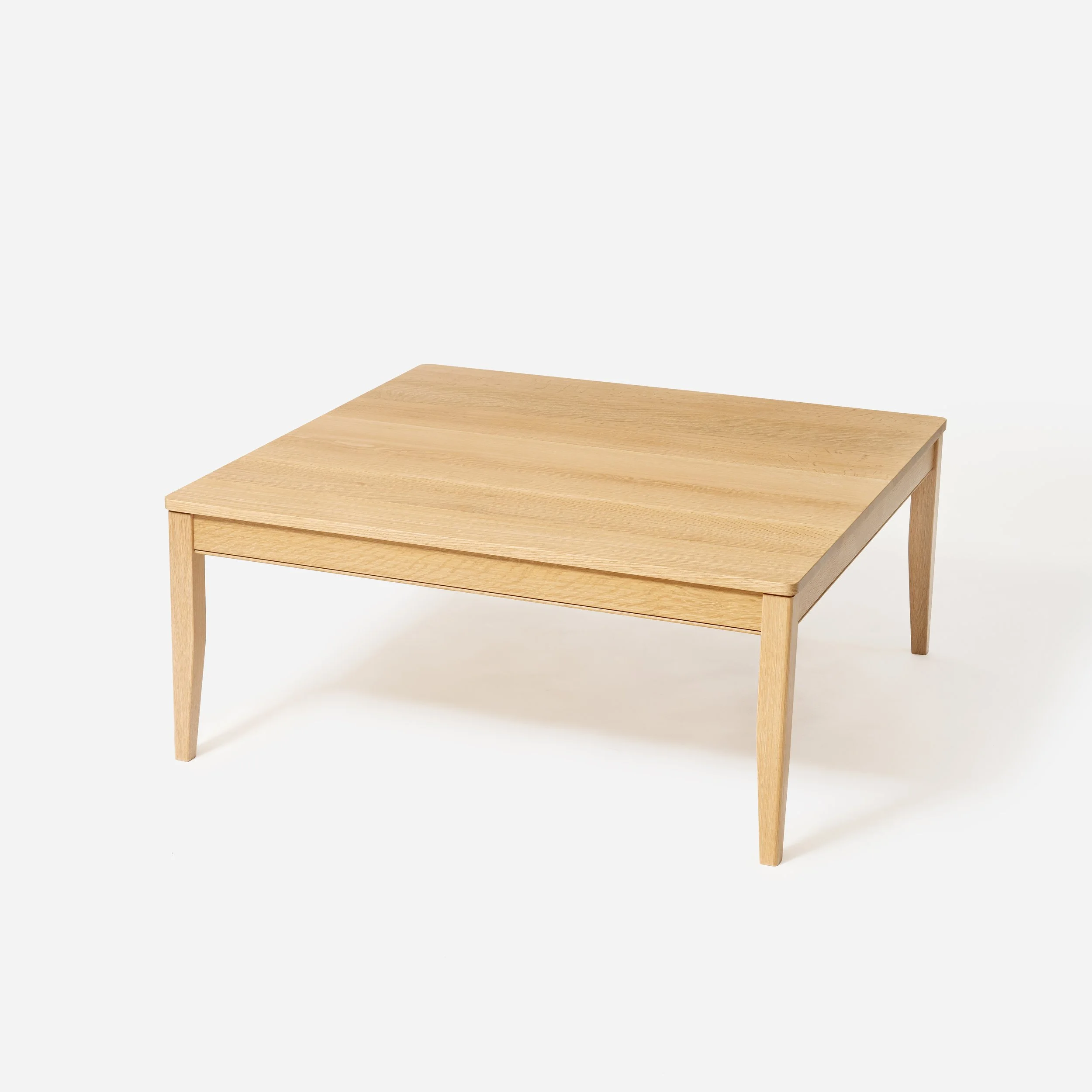 Handcrafted Velora Coffee Table made from premium white oak with natural finish, modern design, traditional joinery, and ample tabletop space, made in Milwaukee.
