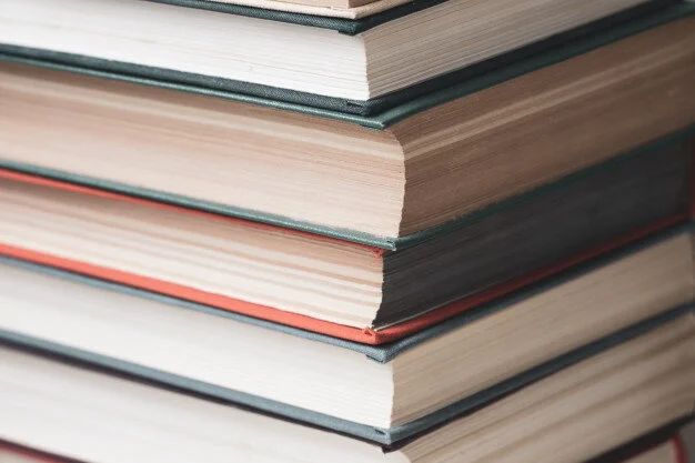 stack-multicolored-books-closeup_113966-2.jpg