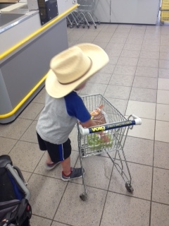 No surprise, their little cowboy didn't leave Texas without his cowboy hat! You can take the cowboy out of Texas, but can't take Texas out of this cowboy!