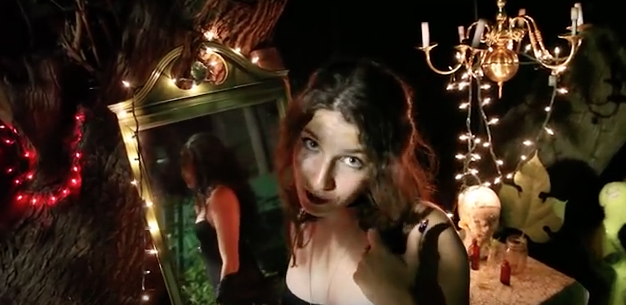Mima Good in the video for "Bad Bad Witch'