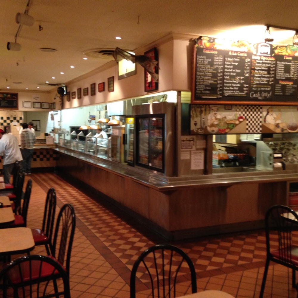 Andre's restaurant's interior and serving area