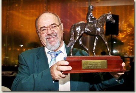 Fred Crabbia displays his Singapore Horse Of The Year Trophy for Rocket Man