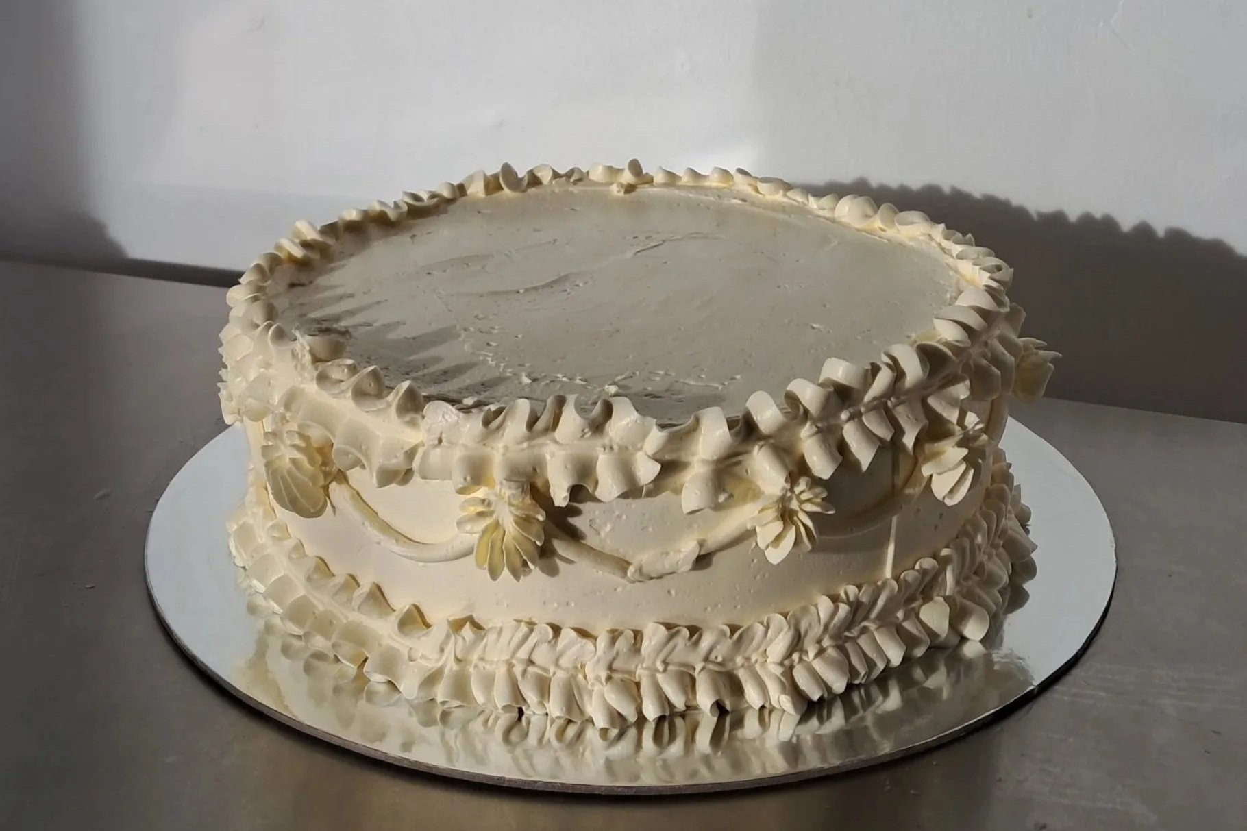 BROWN BUTTER AND BOYSENBERRY CAKE WITH SWISS MERINGUE BUTTERCREAM