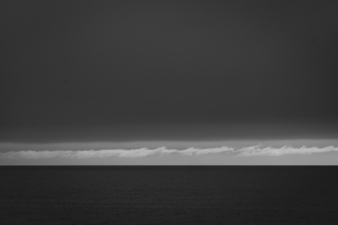 Slice through heavy clouds in morning