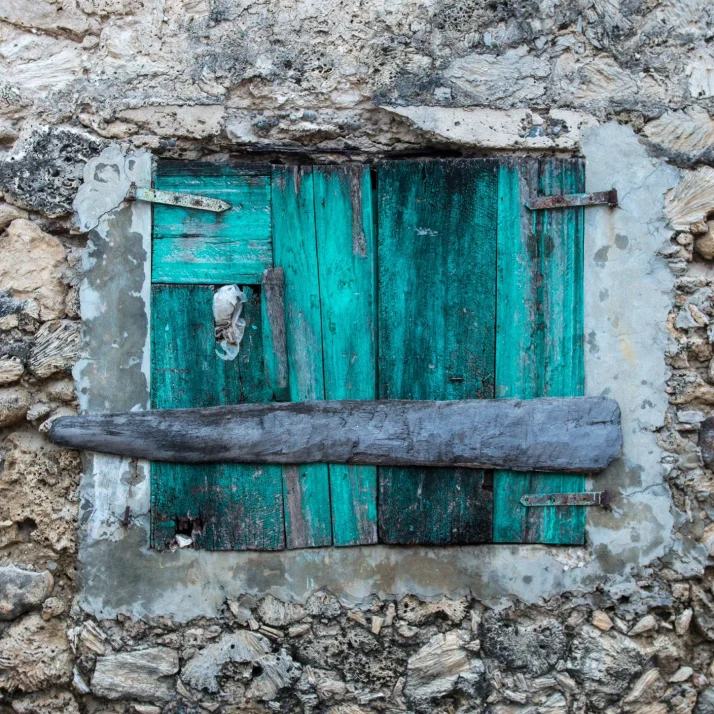 Colorful windows and doors line the streets of the coastal village of Anse d’Hainault, Haiti.