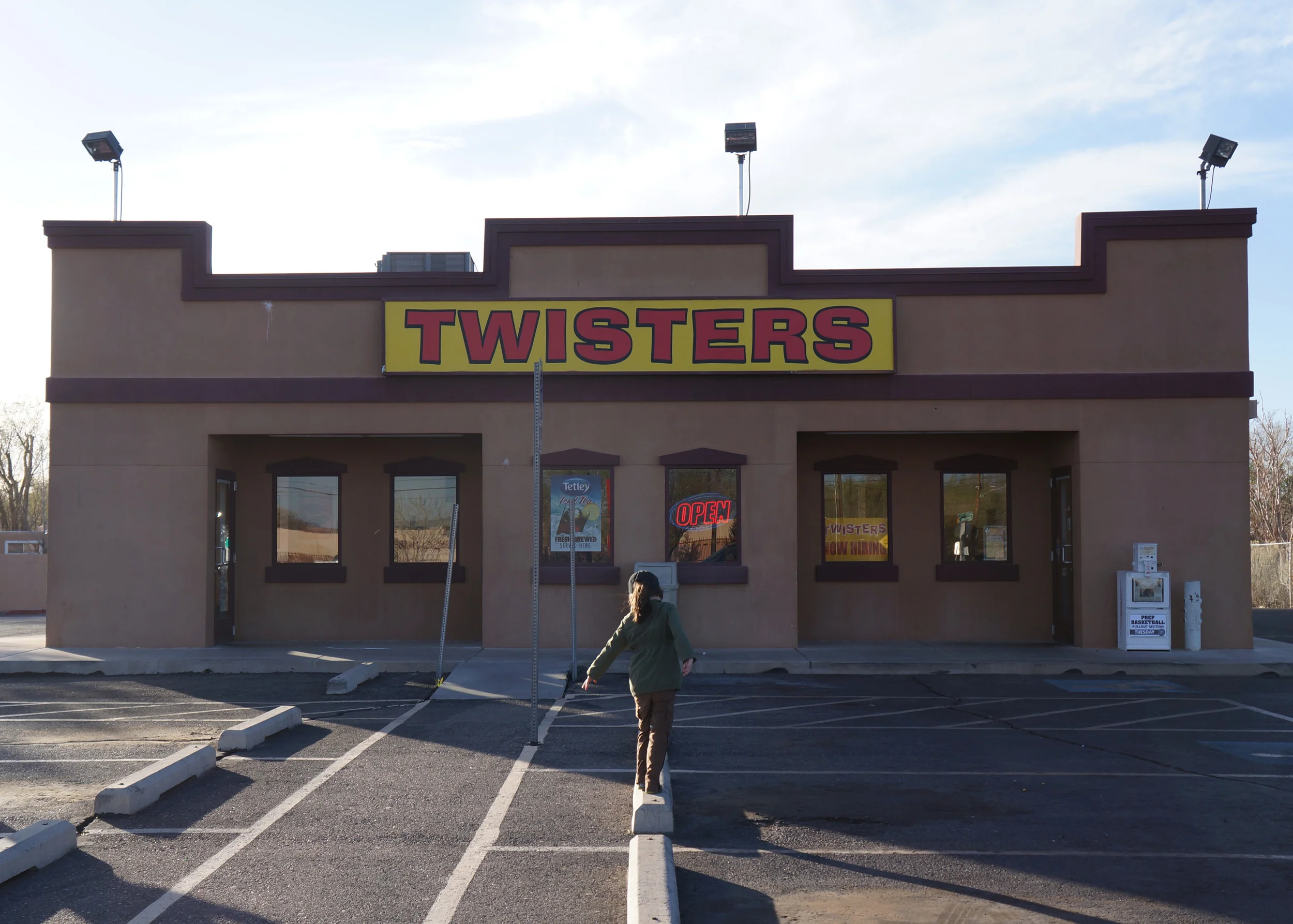 My daughter trying to figure out what's so special about this chicken place.
