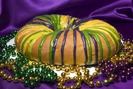 King Cake is a tradition that you can use as a grooms cake or create mini versions to hand out as favors to guest.